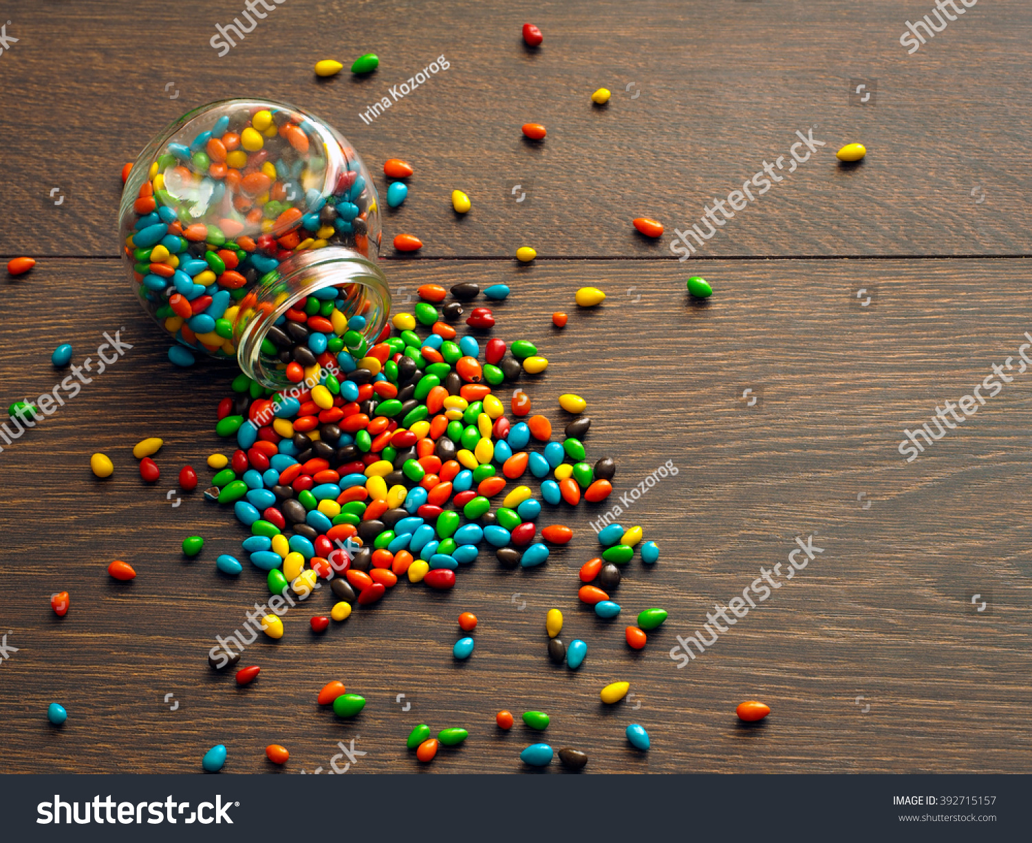 Download Candy Scattered On Floor Glass Jar Stock Photo Edit Now 392715157 Yellowimages Mockups