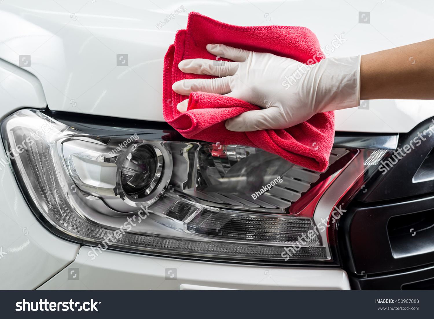 Car Detailing Series Closeup Of Hand Cleaning White Car Paint Stock