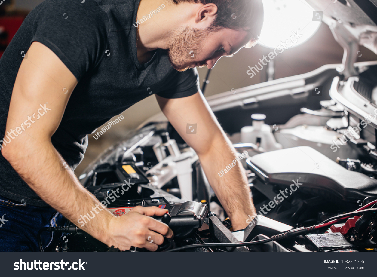 Car Mechanic Using Electrical Tool Testing Stock Photo (Edit Now