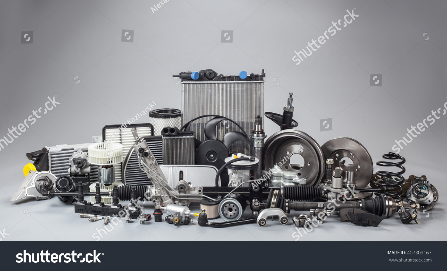 Car Parts On Gray Background Stock Photo (Edit Now) 407309167