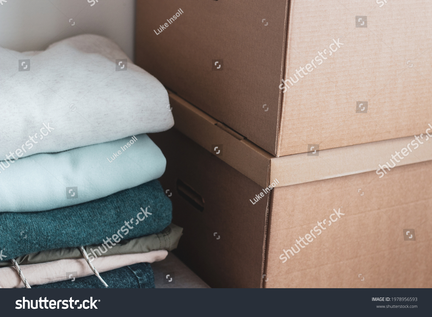 Cardboard Moving Boxes Next Pile Folded Stock Photo 1978956593 ...