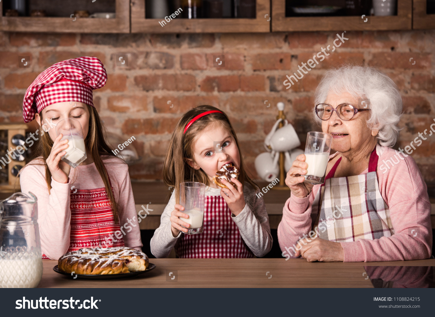 Caring Granny Two Little Granddaughters Drinking Stock Photo (Edit Now ...