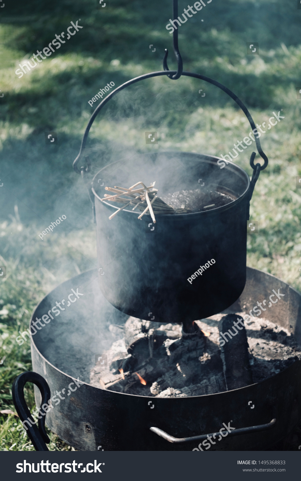 Castiron Pot Boiling Herbal Sauce Over Stock Photo Edit Now