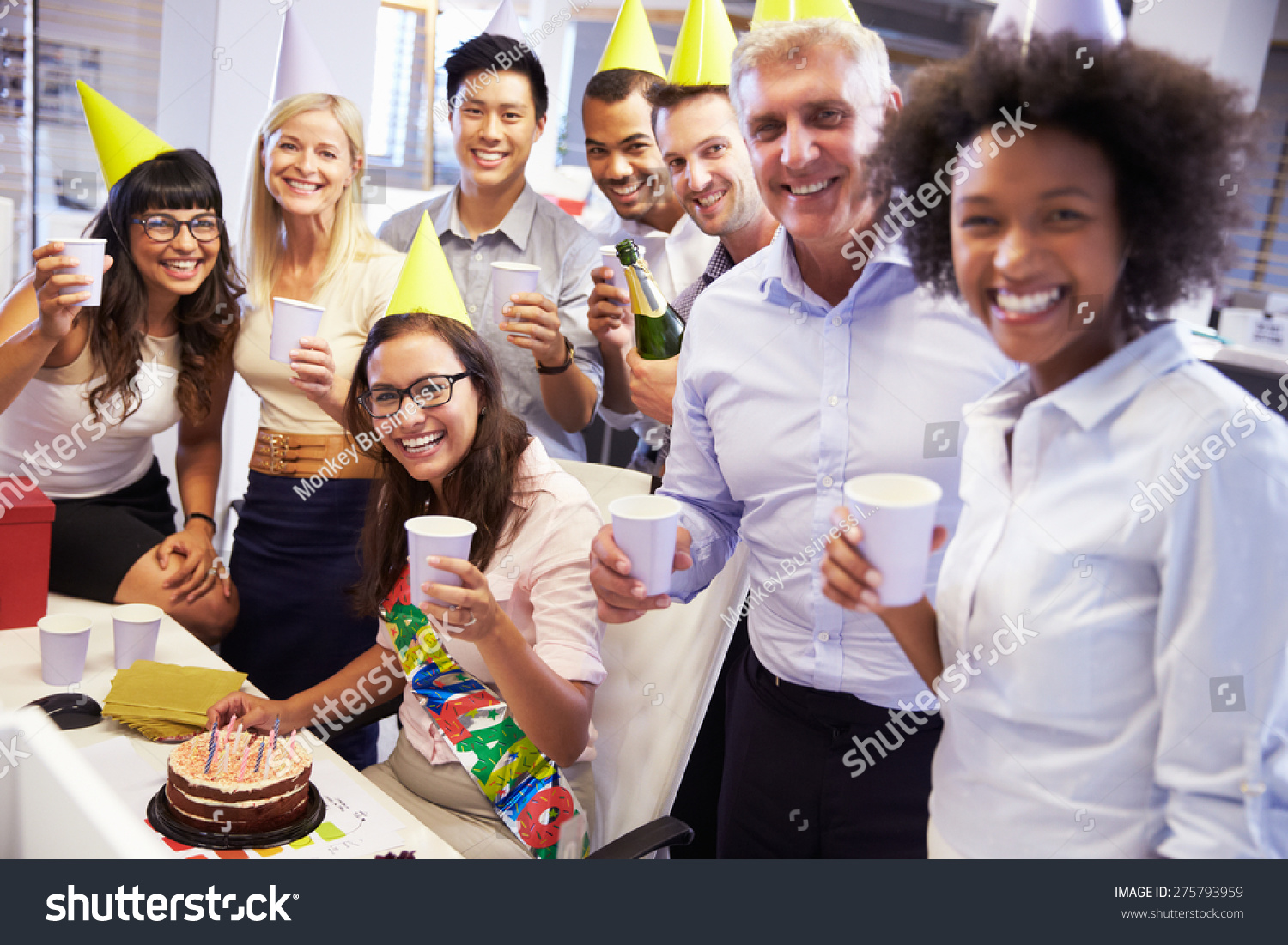 celebrating-colleagues-birthday-office-stock-photo-275793959-shutterstock