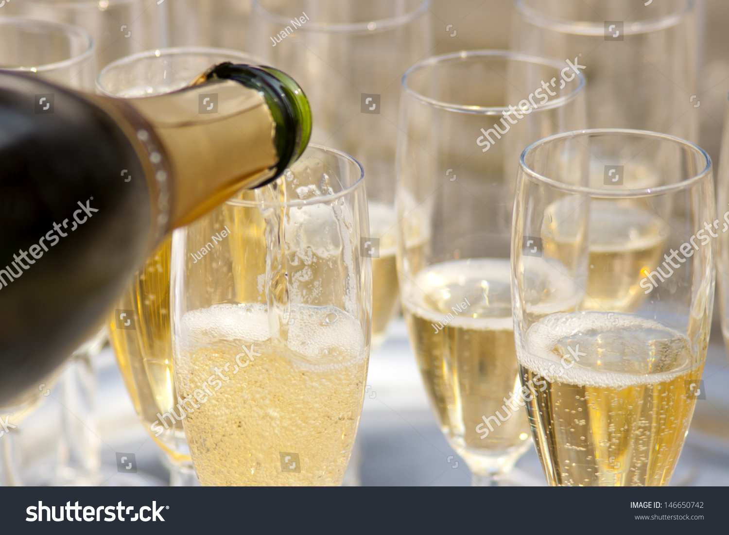 Champaign. Champaign Being Pored Into Glasses. Stock Photo 146650742 ...