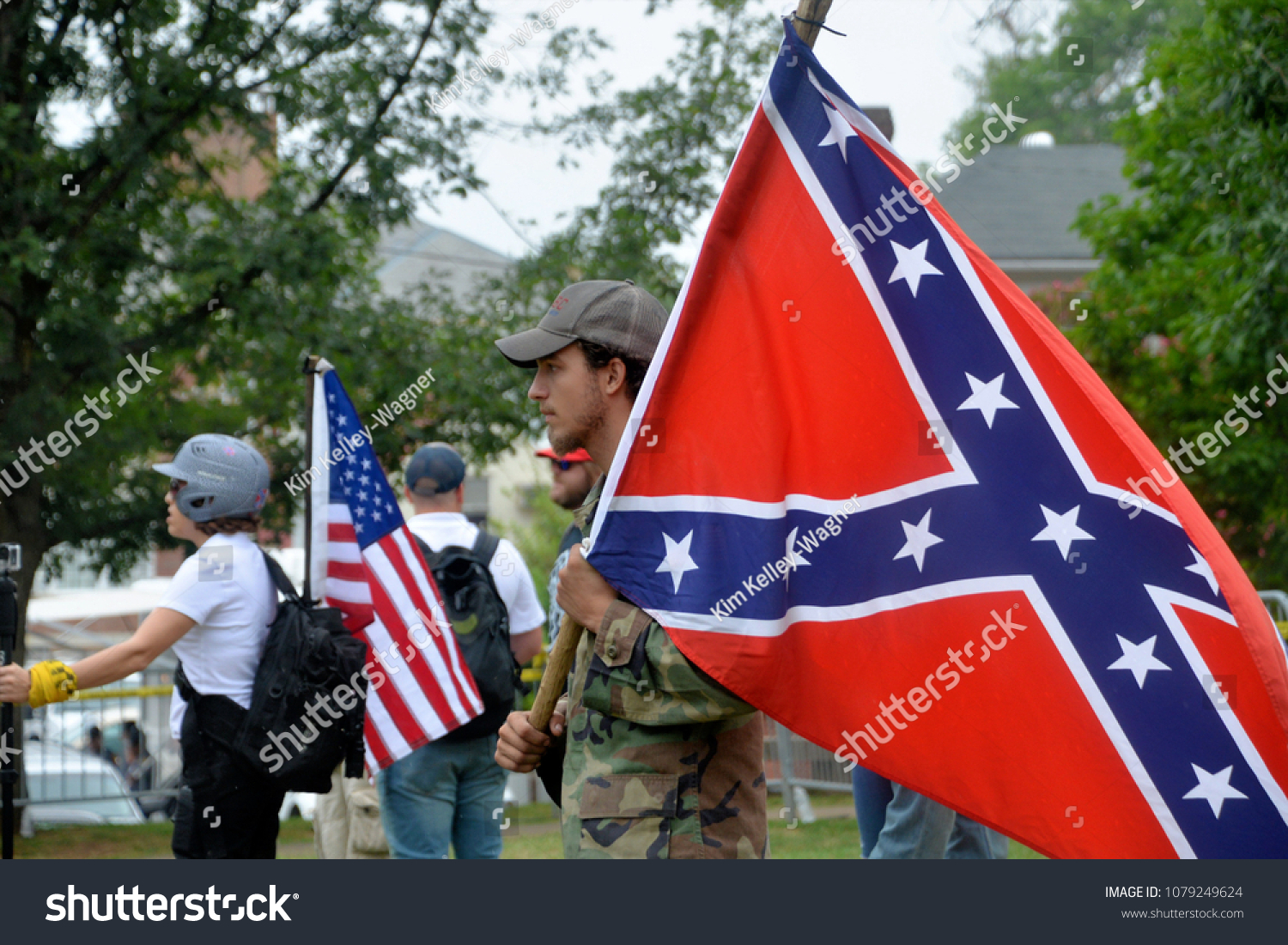 “Dear God, please help me to hate white people.” Stock-photo-charlottesville-va-august-members-of-a-white-supremacist-group-at-a-white-nationalist-1079249624
