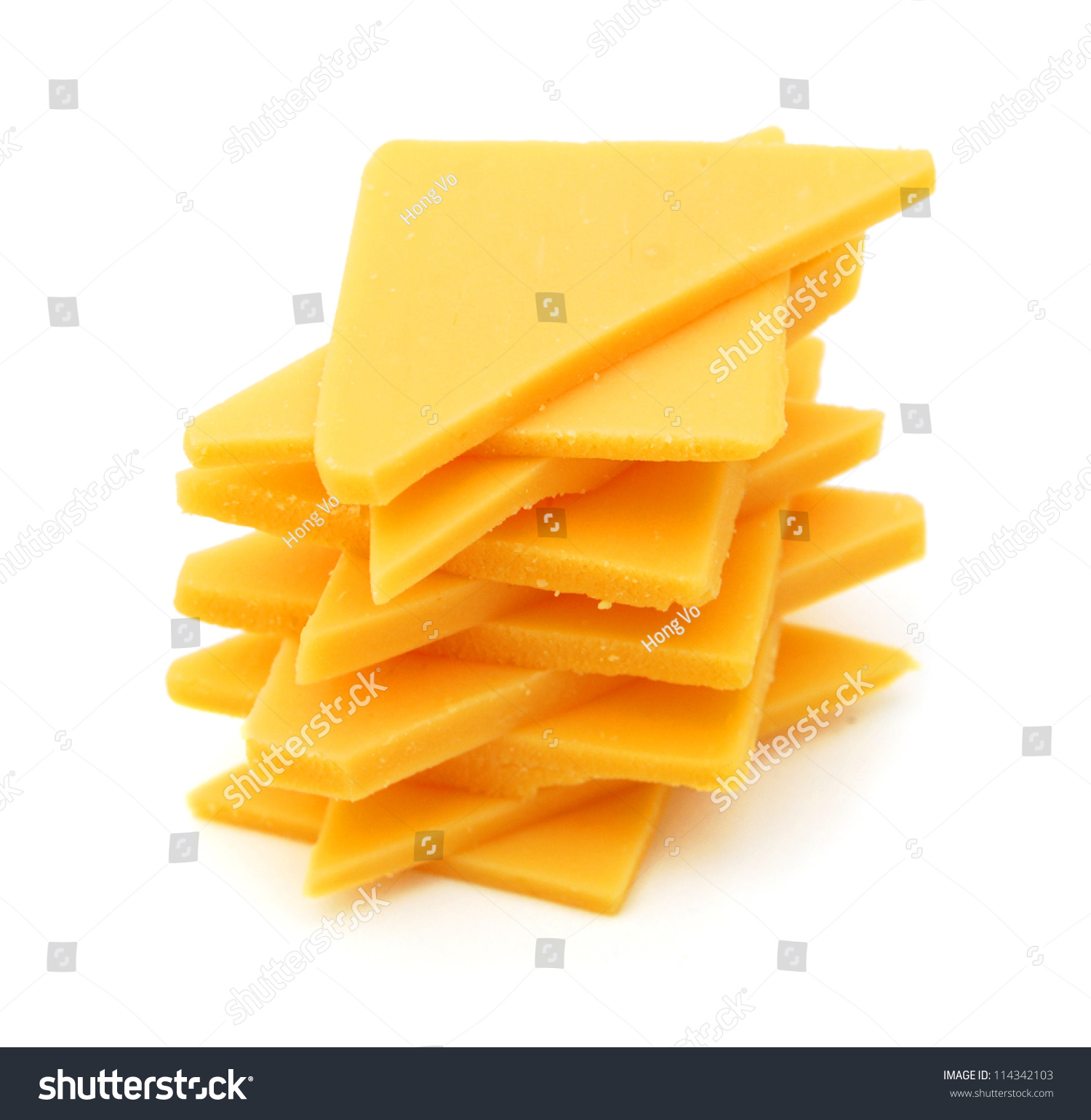 Cheddar Cheese Slices On White Background. Stock Photo 114342103 ...