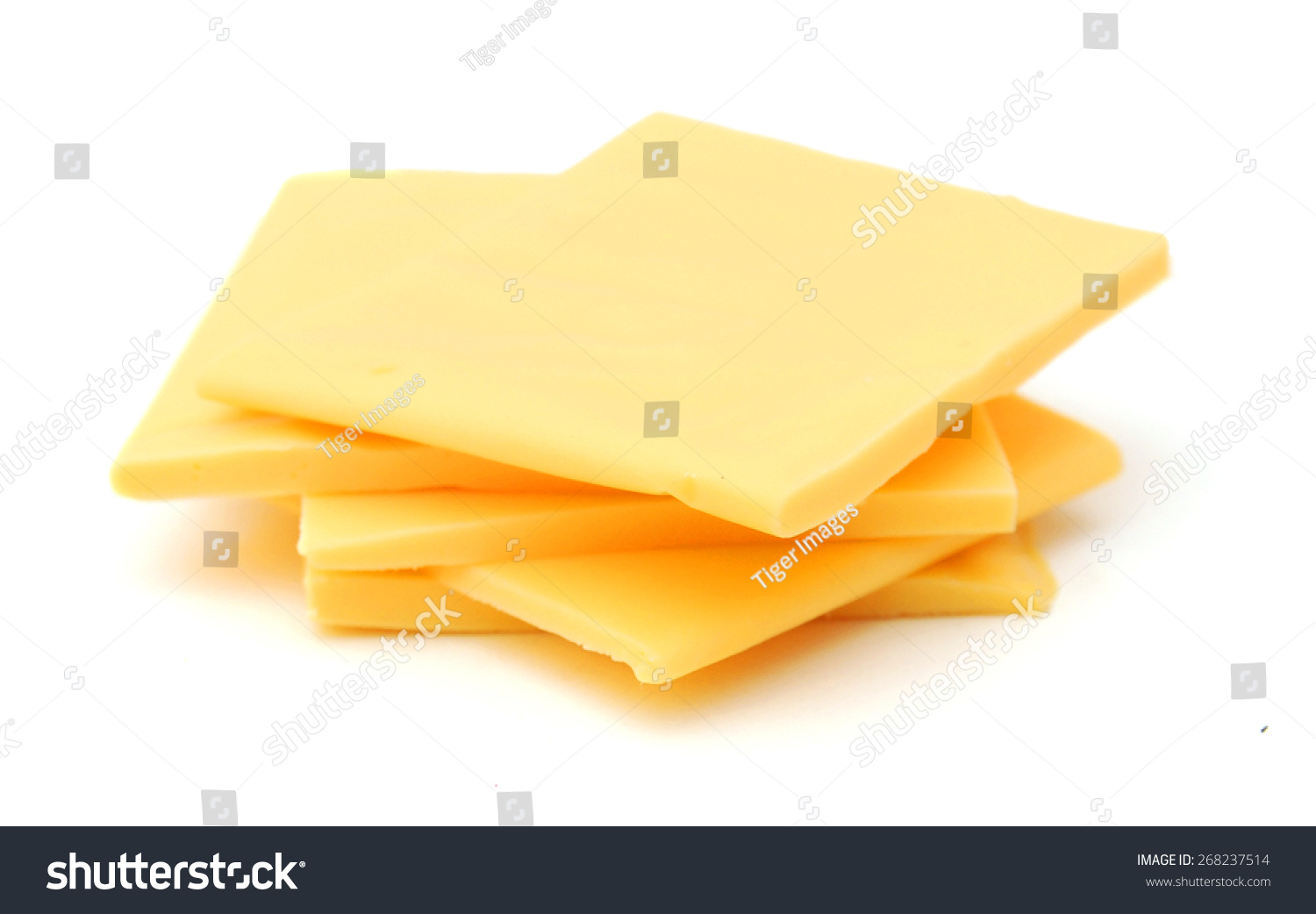 Cheddar Cheese Slices On White Background Stock Photo 268237514 ...