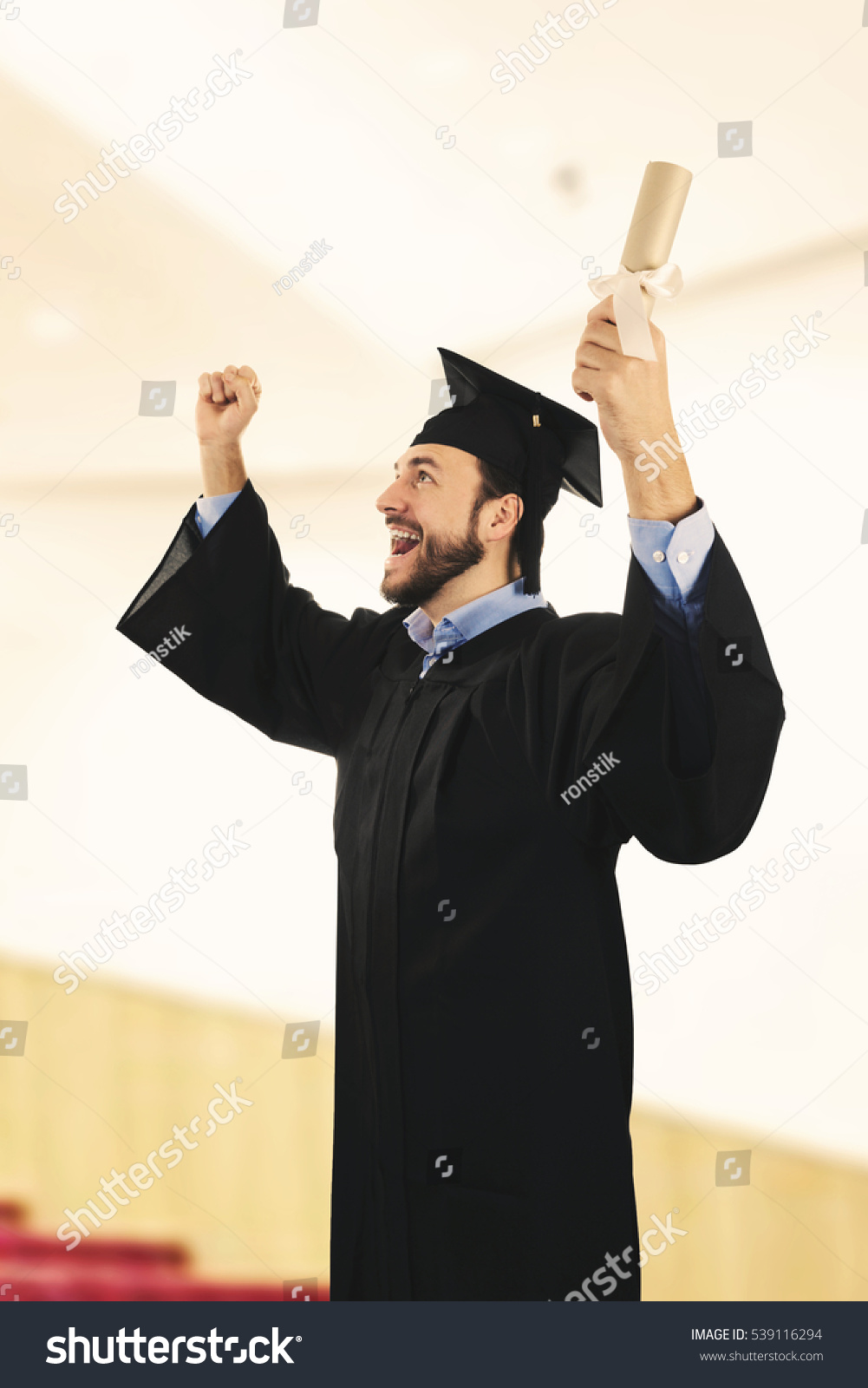 Cheerful College Graduate Wearing Gown Graduation Stock Photo 539116294 Cheerful College Graduate Wearing Gown Graduation Stock Photo 539116294