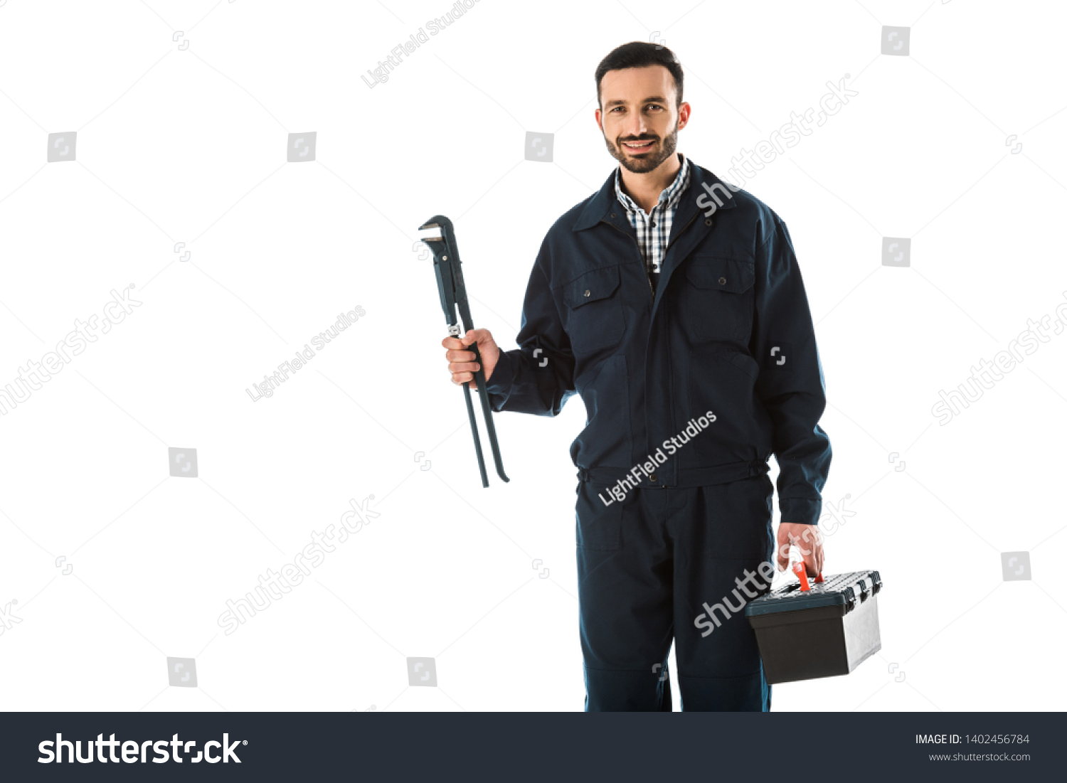 Cheerful Plumber Overalls Holding Adjustable Wrench Stock Photo 1402456784 Shutterstock
