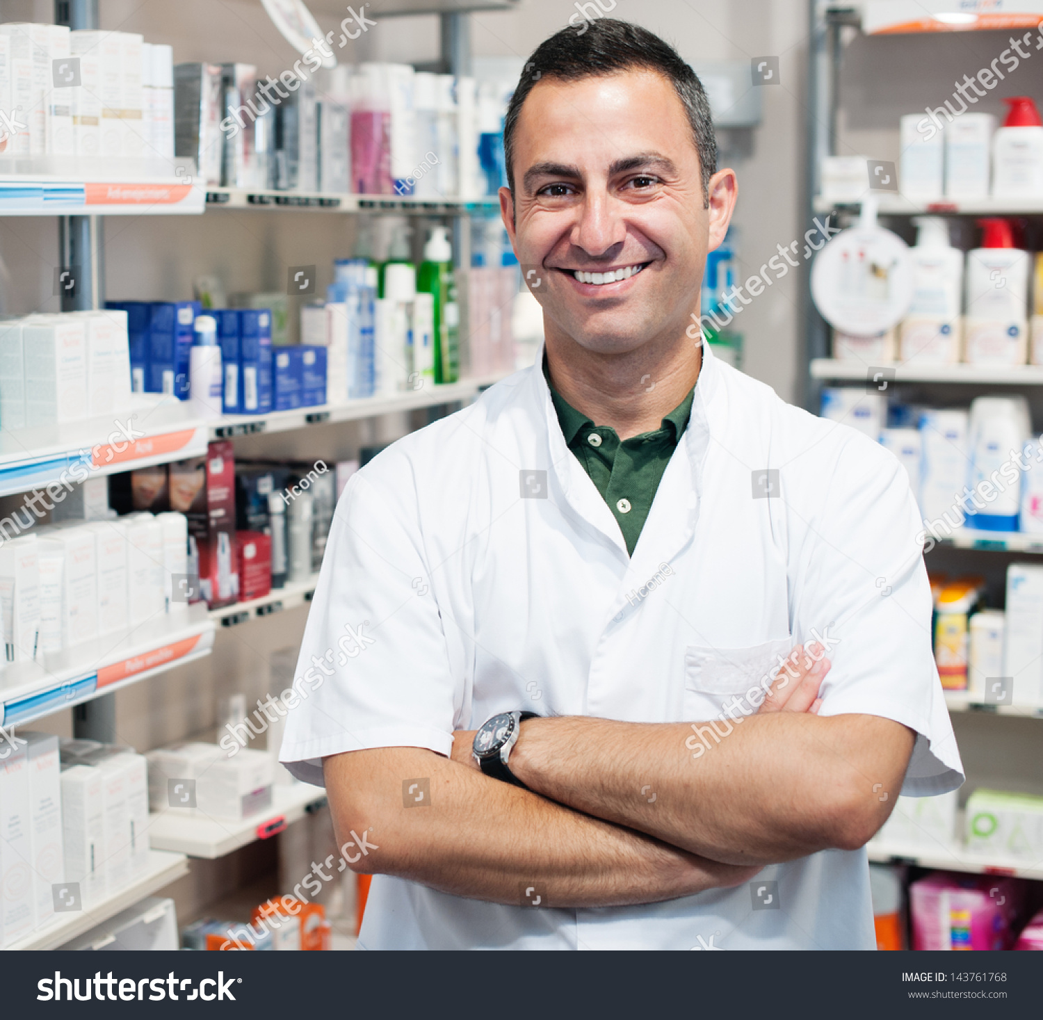 Cheerful Smiling Pharmacist Chemist Man Standing In Pharmacy Drugstore ...