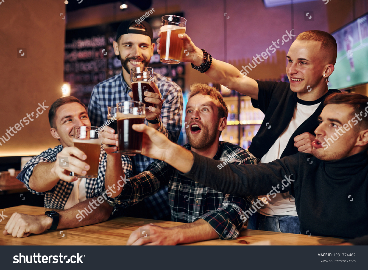 Cheering By Knocking Beer Glasses Group Stock Photo 1931774462 ...