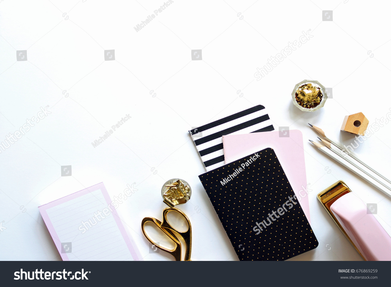 white and gold office supplies