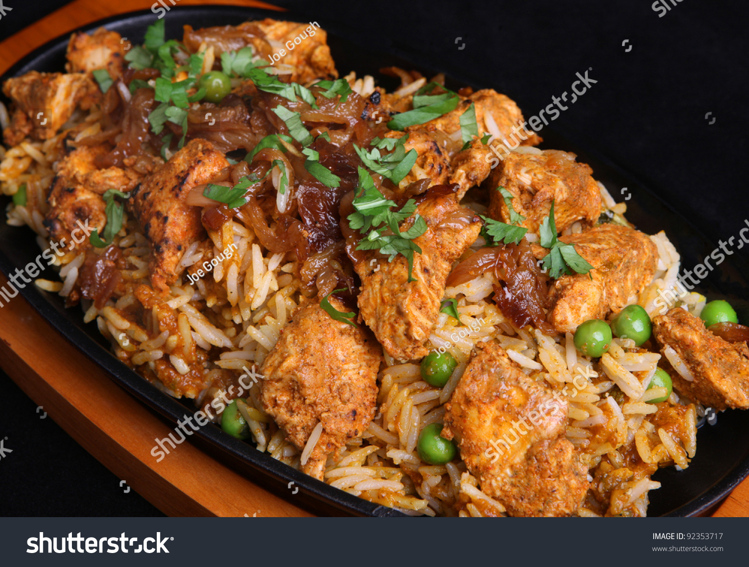 Chicken Tikka Biriyani In A Cast Iron Sizzler Dish Stock Photo 92353717 ...