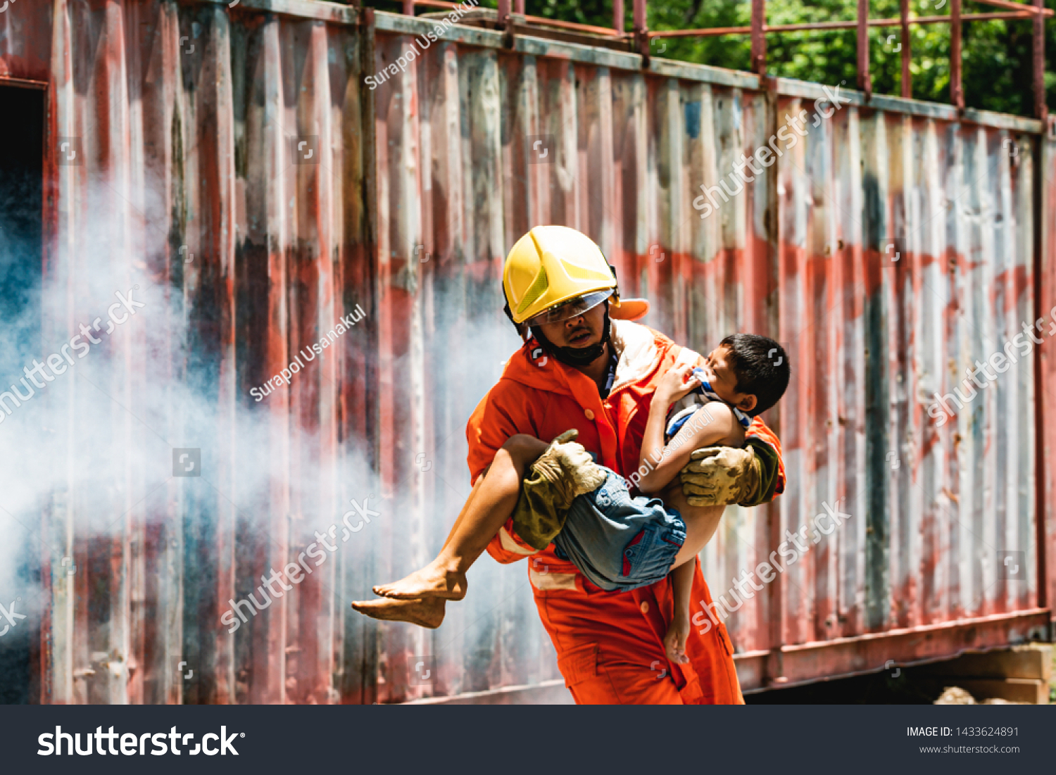 Child Being Carried By His Fireman Stock Photo 1433624891 | Shutterstock