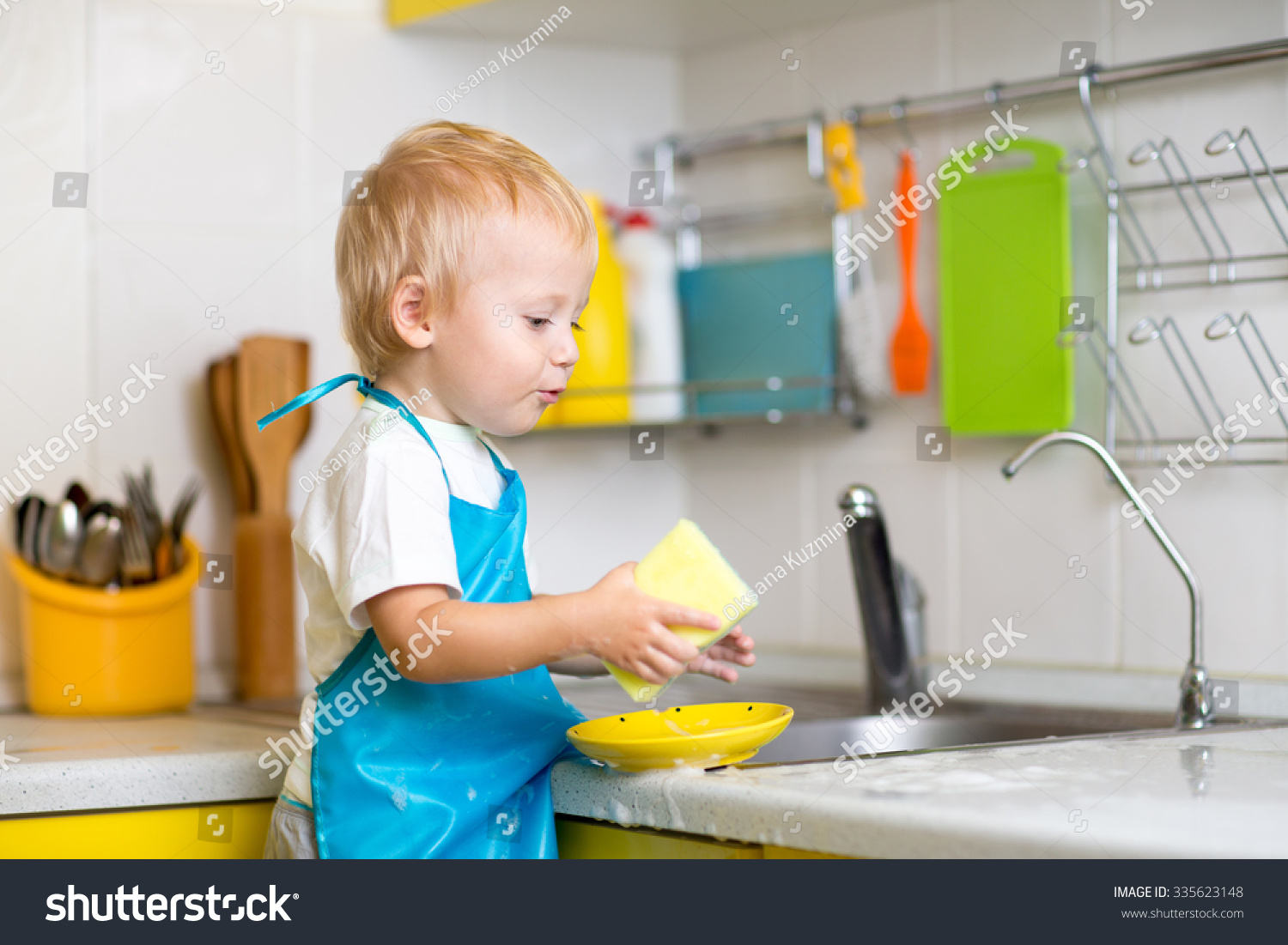 Child Boy Cleaning Kitchen After Dinner Stock Photo 335623148 ...