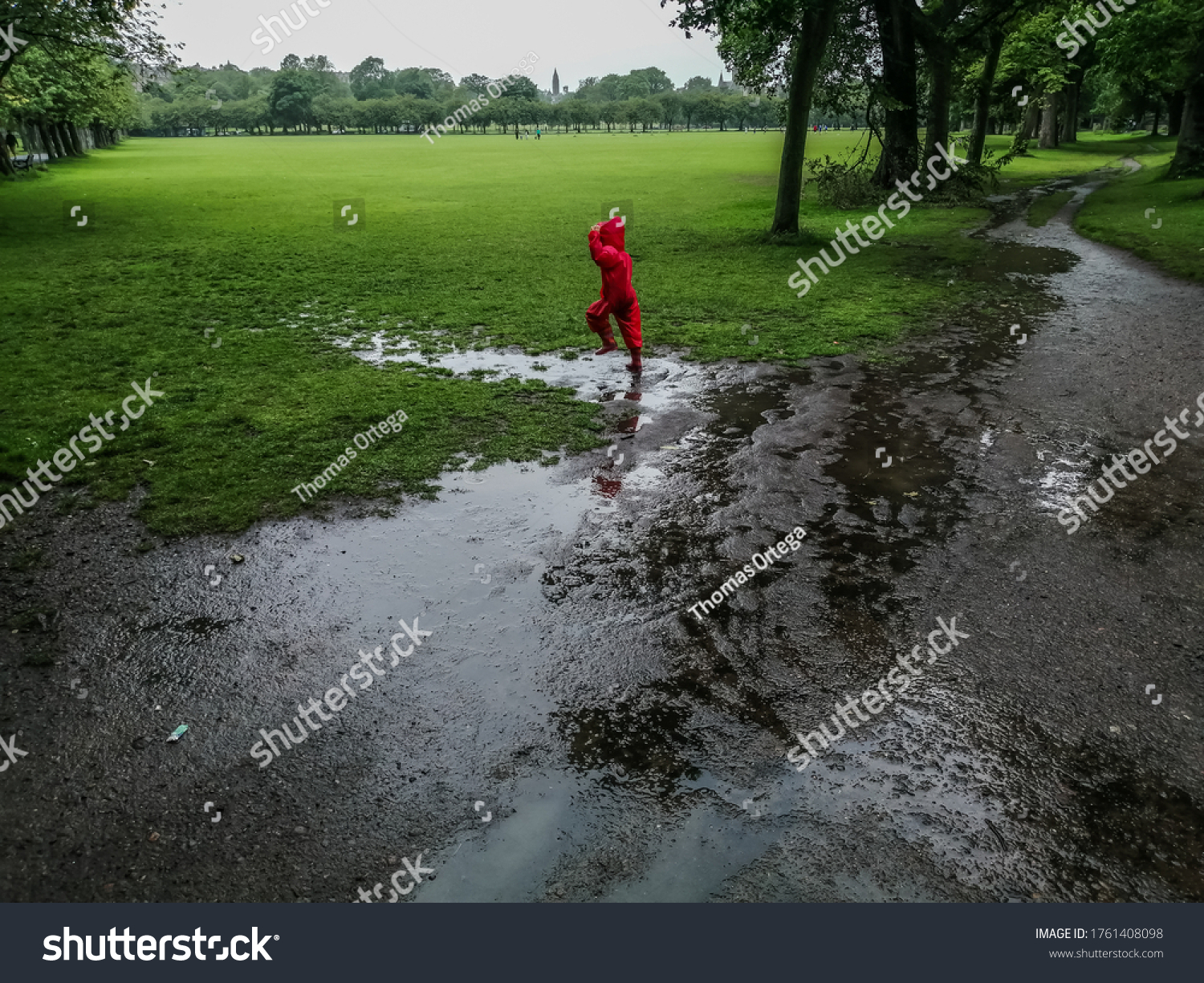 Child Playing Mud Puddle Stock Photo (Edit Now) 1761408098