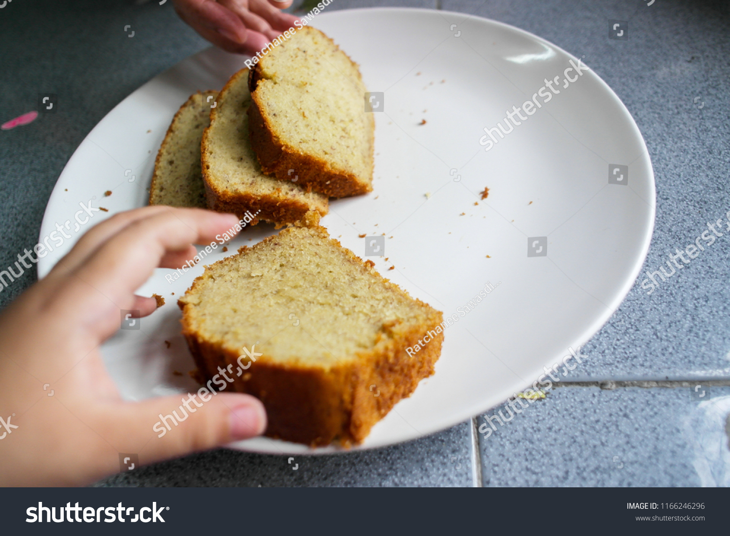 Children Hands Picking Banana Cakes Stock Photo Edit Now 1166246296