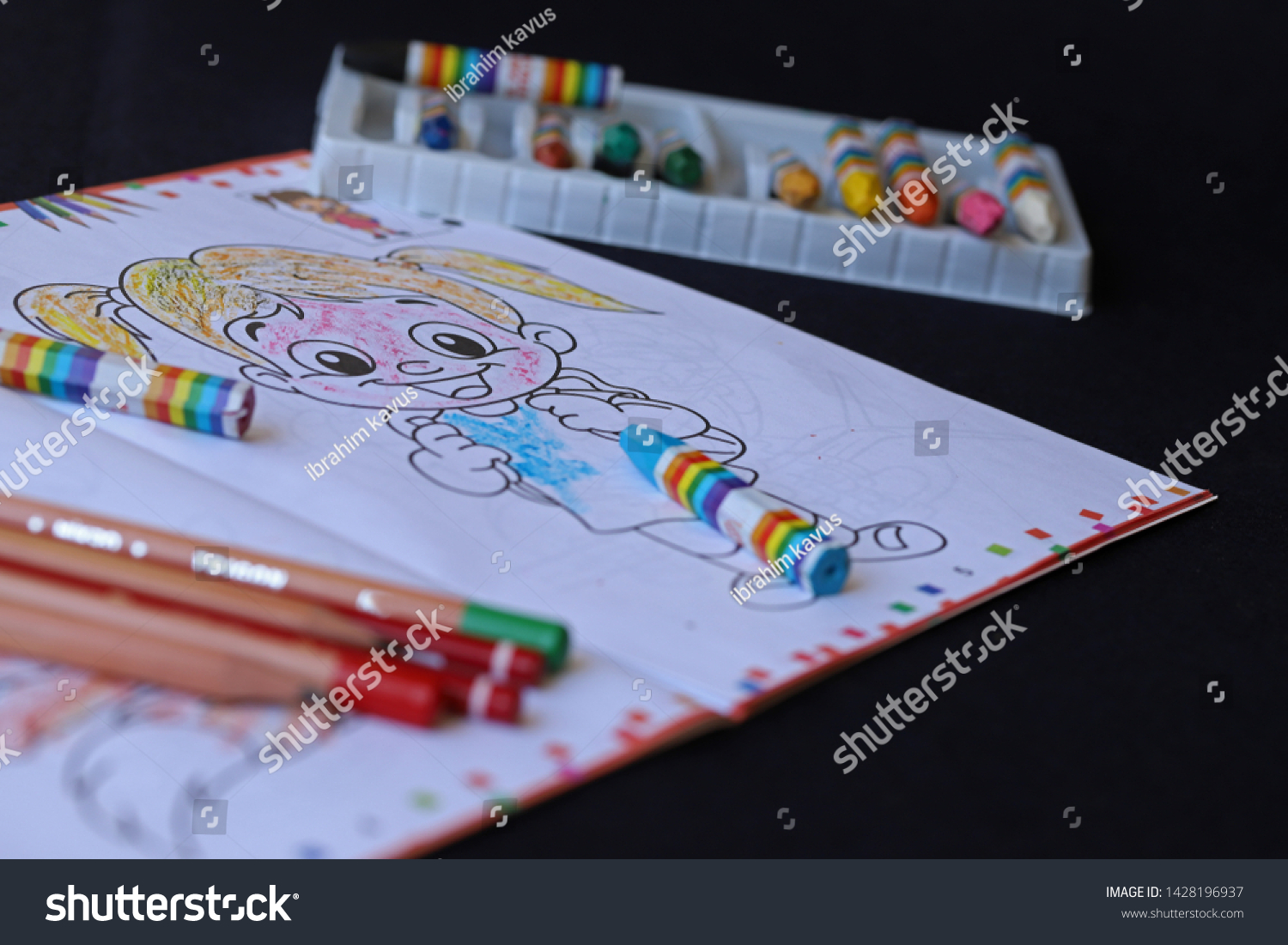Download Childrens Coloring Books Crayons Over Black Stock Photo Edit Now 1428196937