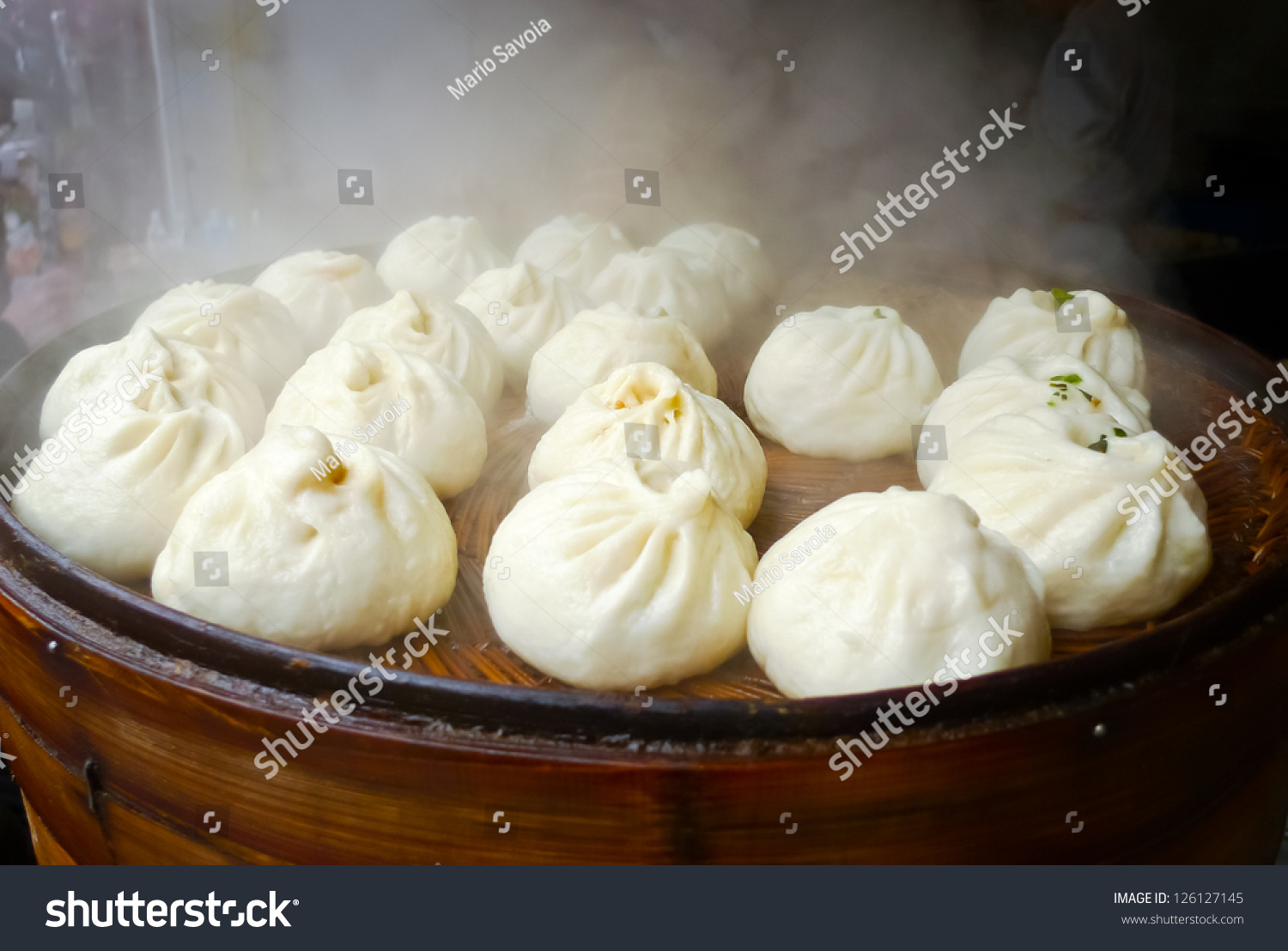 Chinese Dumplings Being Steamed On The Traditional Bamboo Pan Stock ...