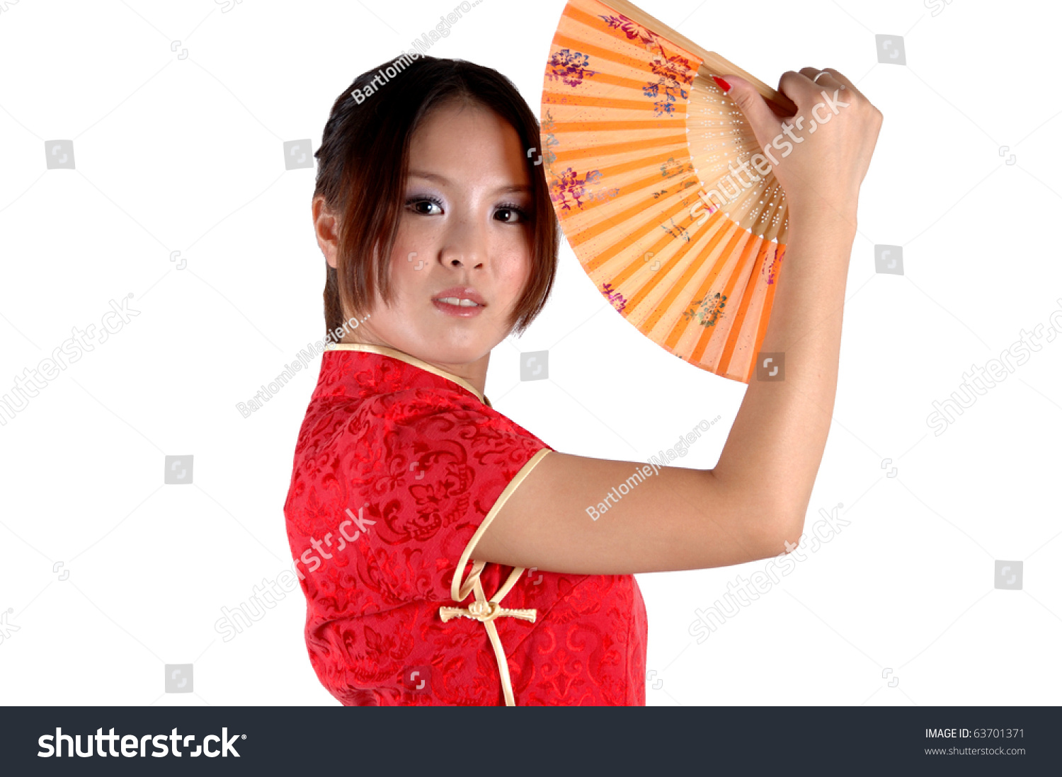 Chinese Model In Traditional Dress Called Qipao, Holding Fan. Asian ...