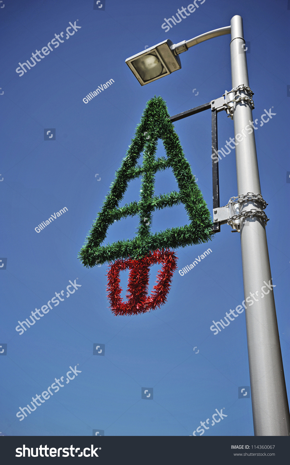 Christmas Decorations Seen On Street Lamps Royalty Free Stock Image