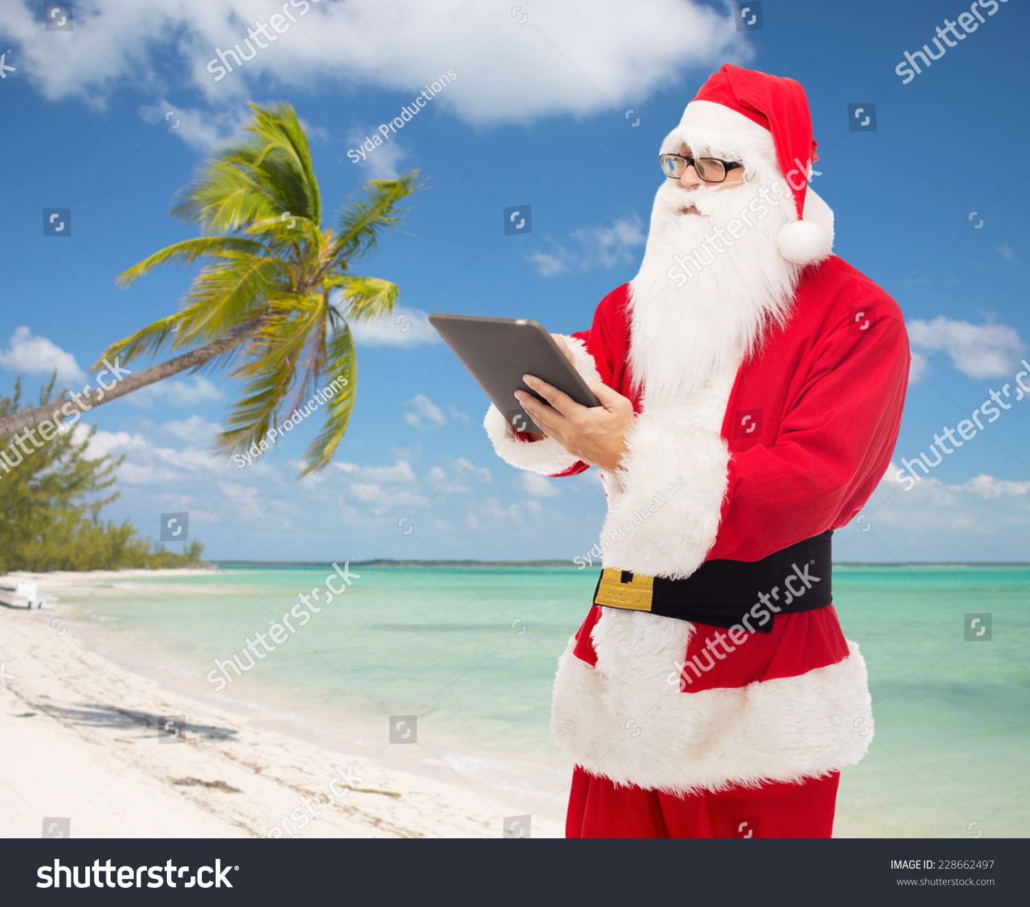 Christmas, Holidays, Technology And People Concept - Man In Costume Of