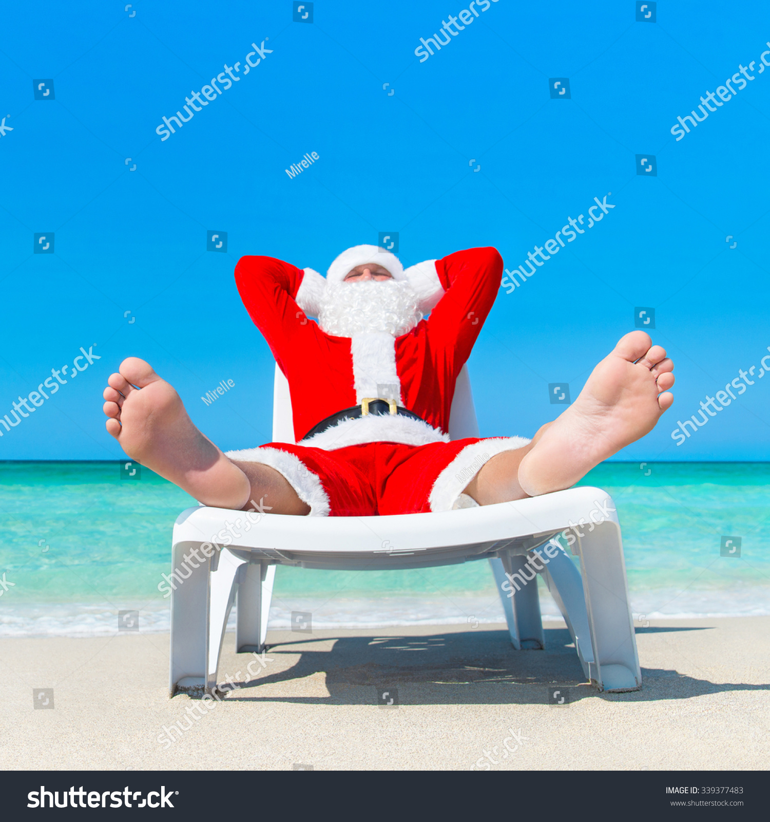 Christmas Santa Claus Sunbathing On Sun Bed At Palm Ocean Tropical ...