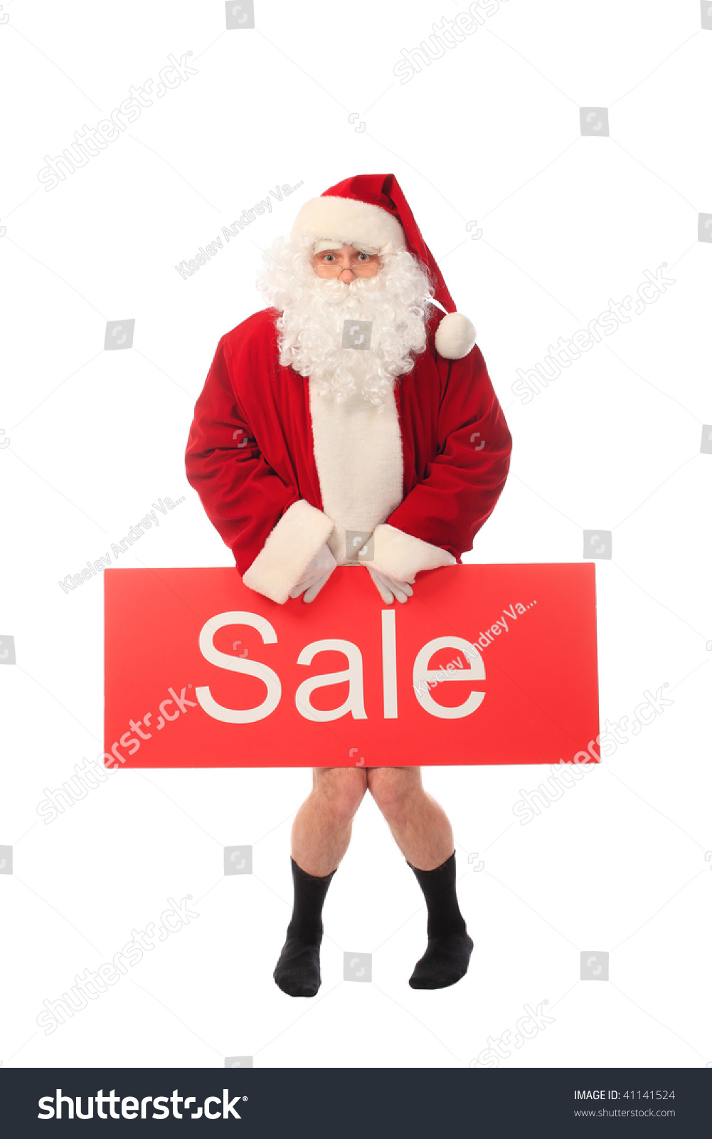 Christmas Theme: Happy Santa Holding Sale Sign, Isolated Over White