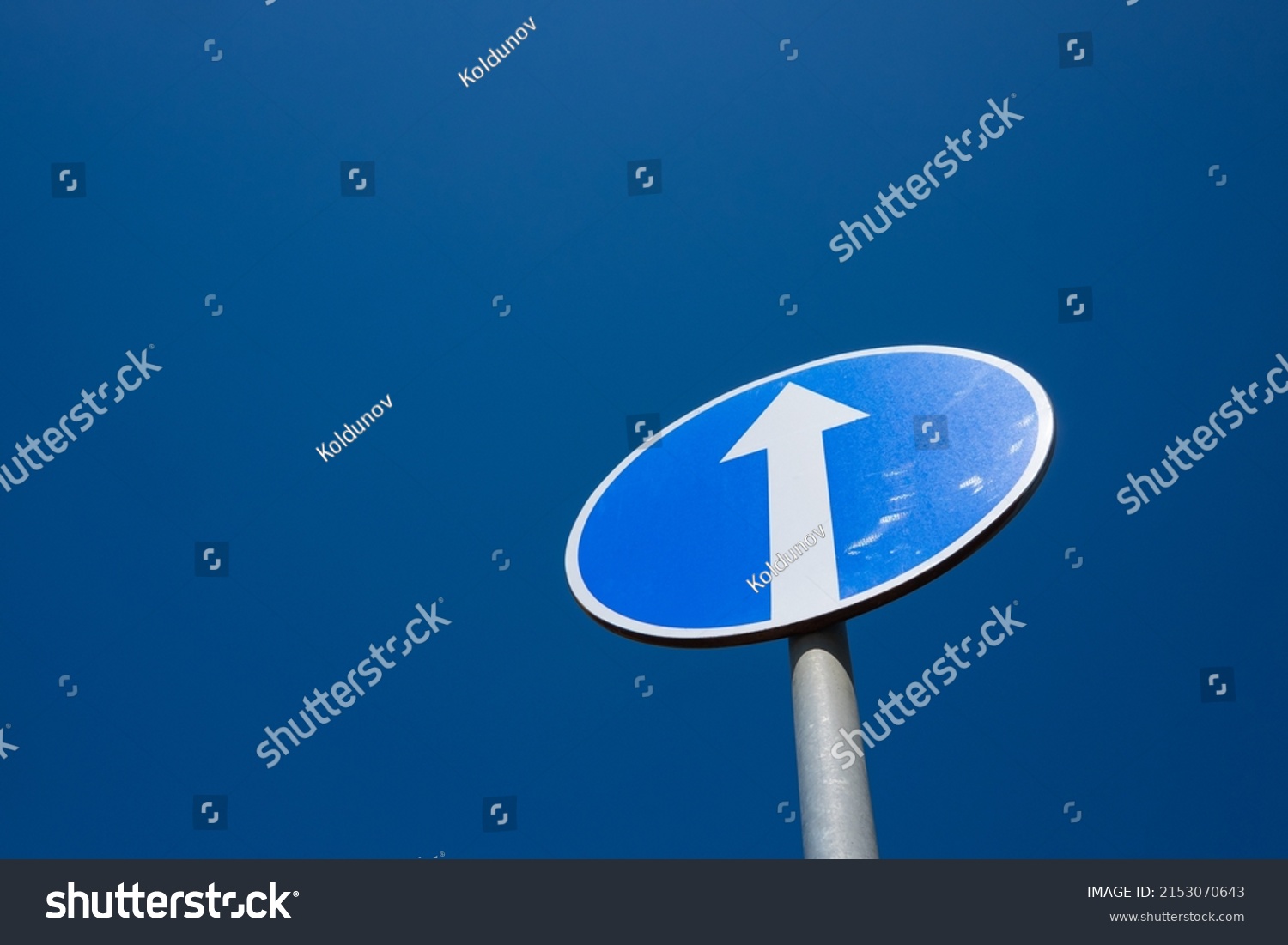 circle-road-sign-white-arrow-on-stock-photo-2153070643-shutterstock