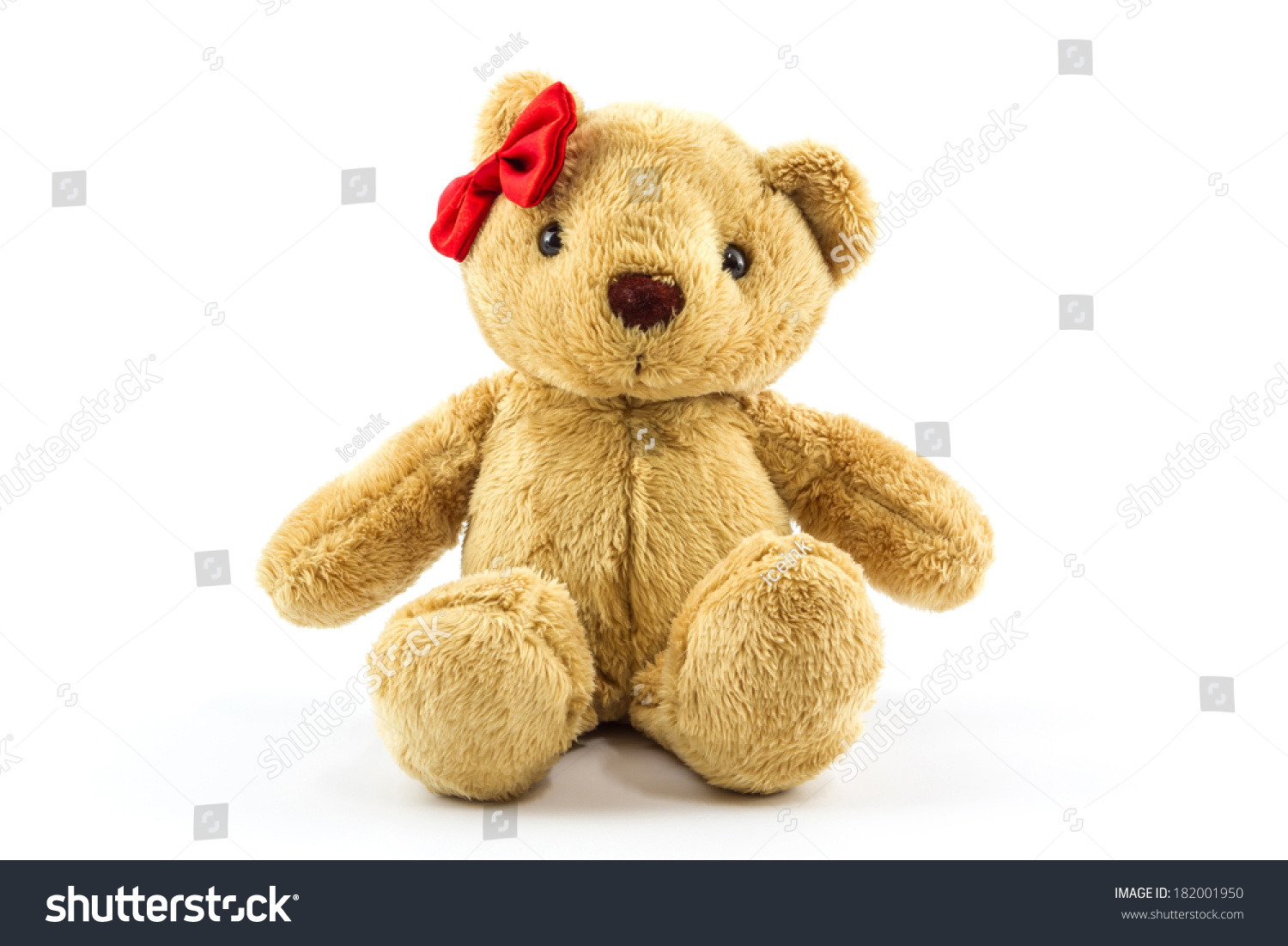 teddy bear with red bow