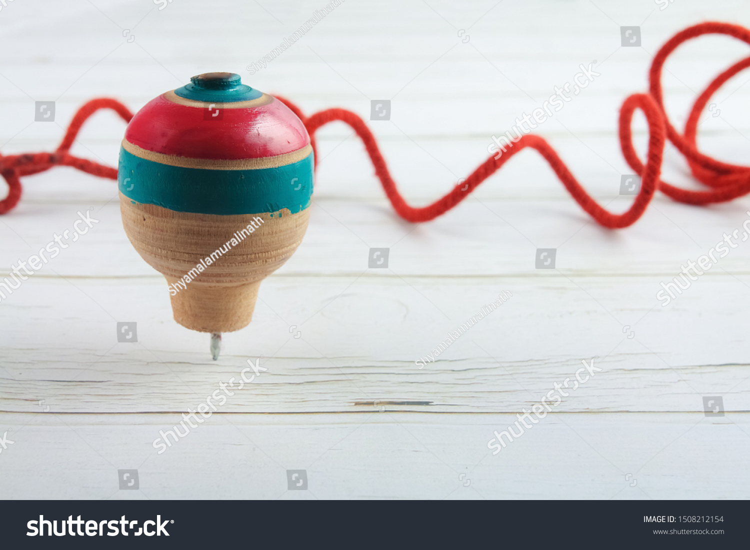 spinning top with rope