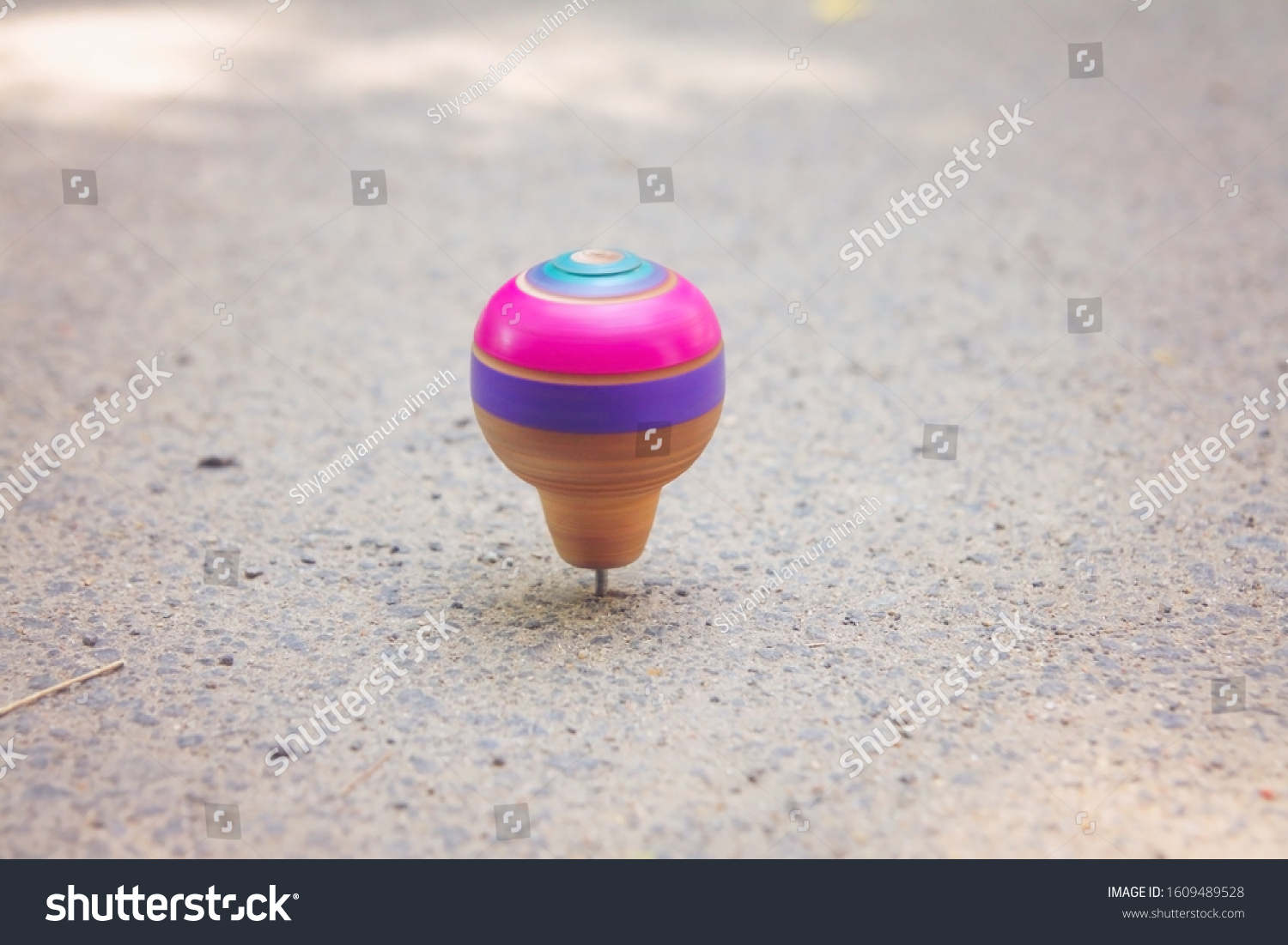 spinning top toy with string