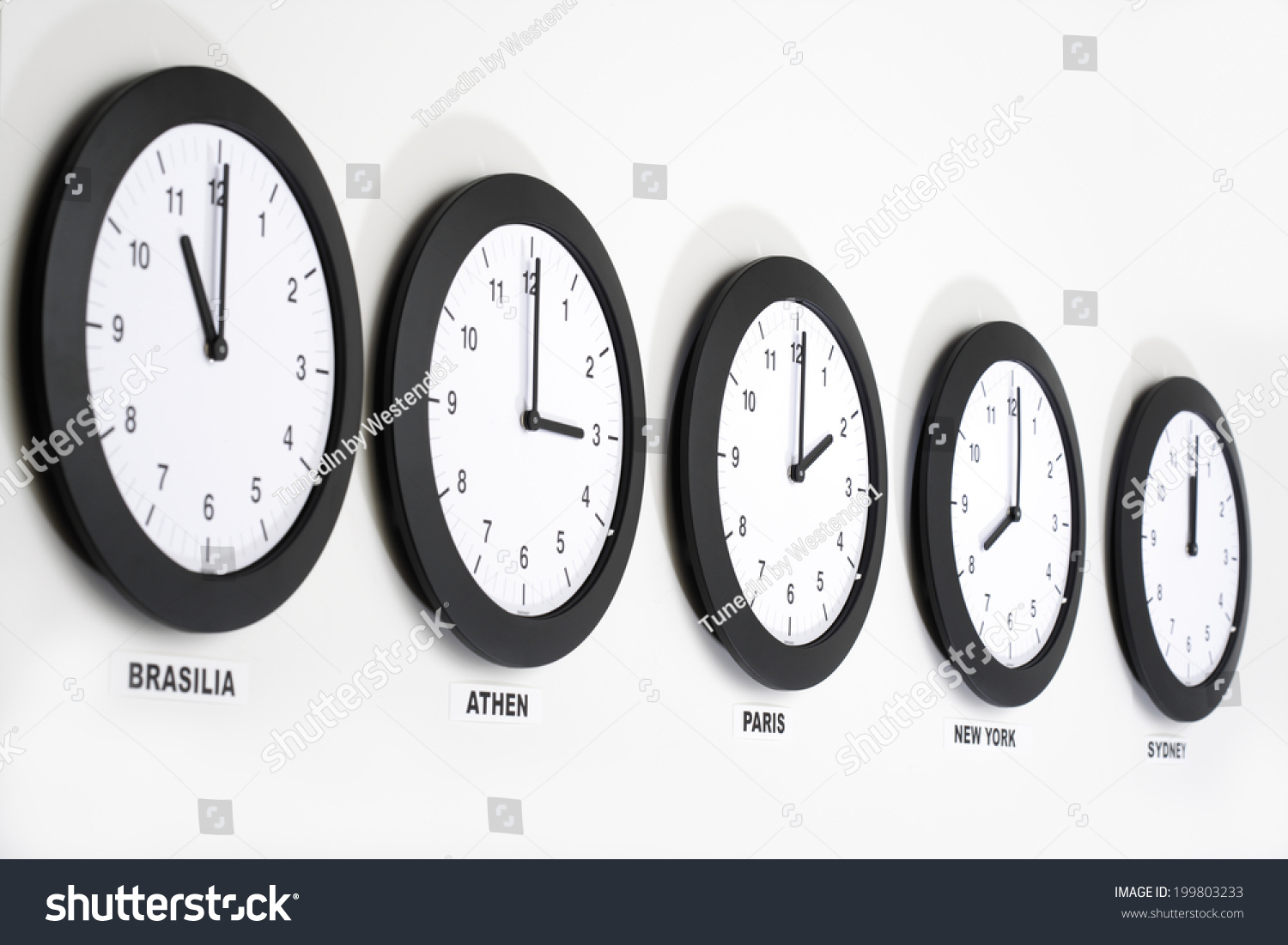 Clocks On Wall, Symbol For Greenwich Mean Time Stock Photo 199803233 ...
