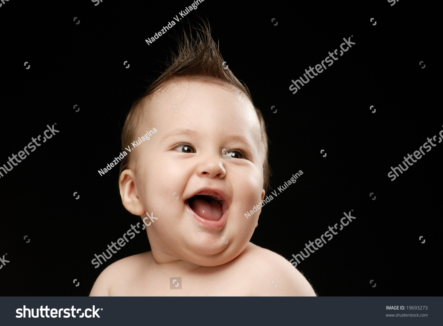 Closeup Baby Looking Sideways Laughing Stock Photo 19693273 Shutterstock