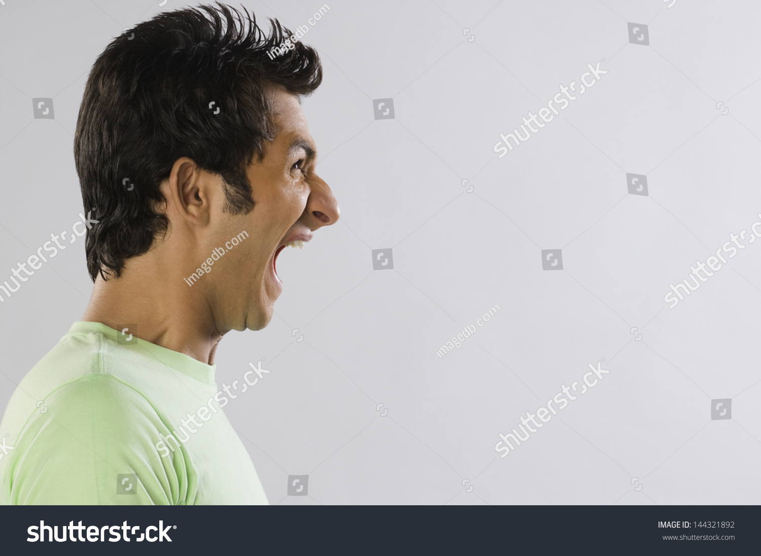 Close-Up Of A Man Screaming Stock Photo 144321892 : Shutterstock