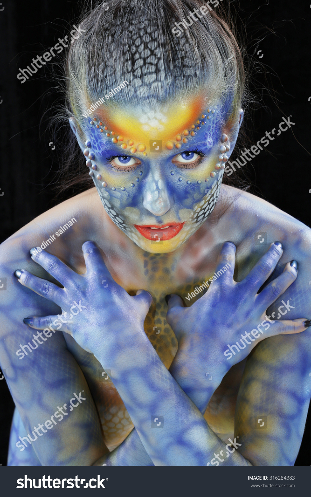 Close-Up Of Body Art - The Girl Chameleon On A Dark Background Studio ...