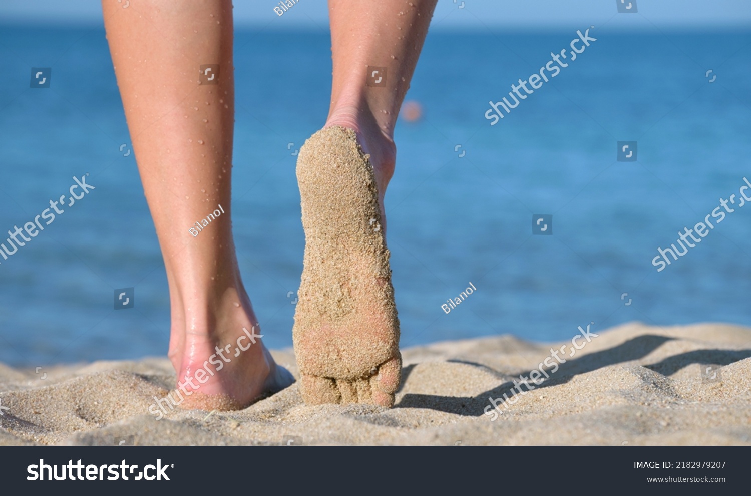 close-female-feet-walking-barefoot-on-stock-photo-2182979207-shutterstock