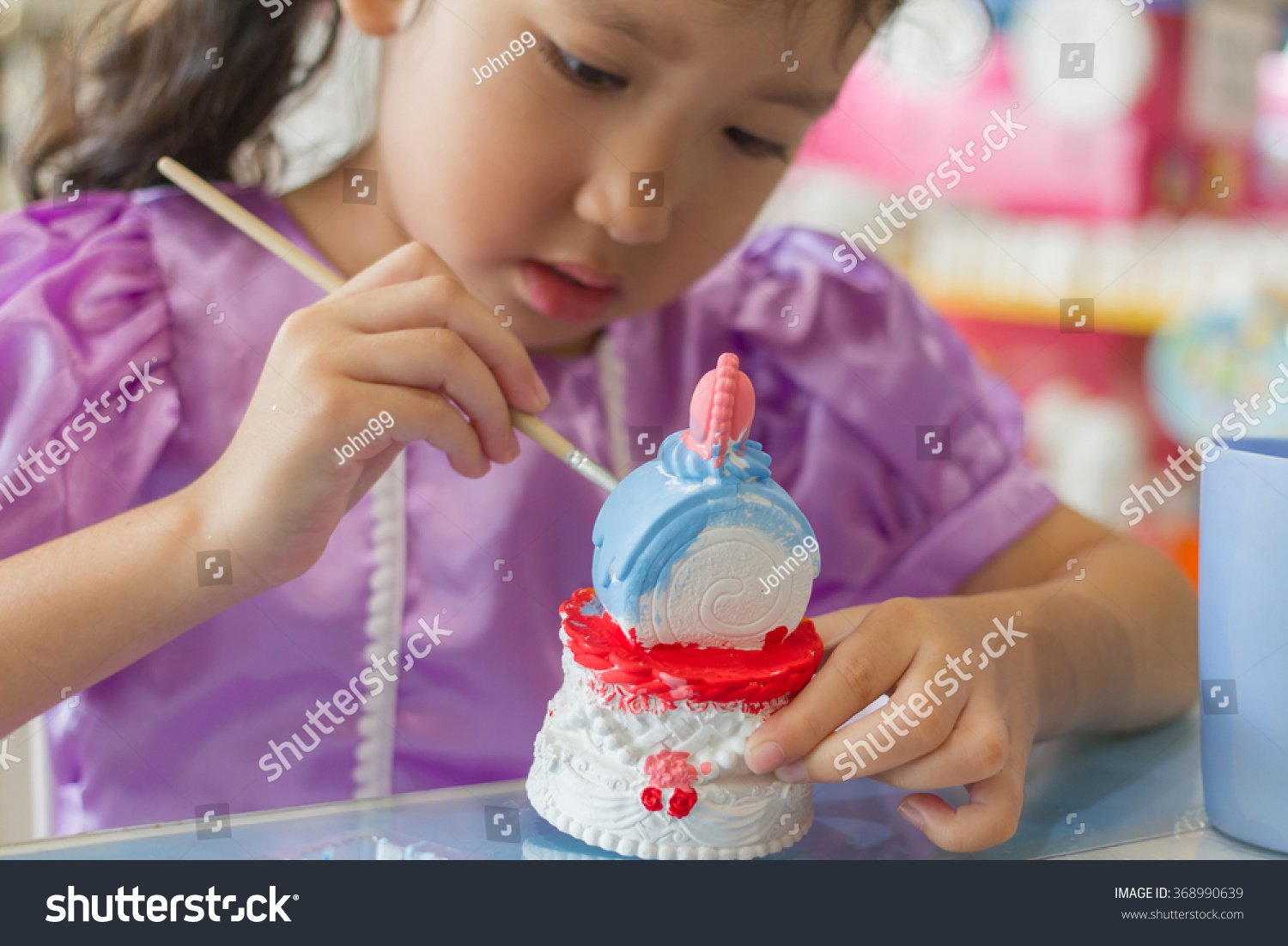 42 256 Painting Plaster Images Stock Photos Vectors Shutterstock   Stock Photo Close Up Of Kid Painting Color On The Plaster Statue 368990639 