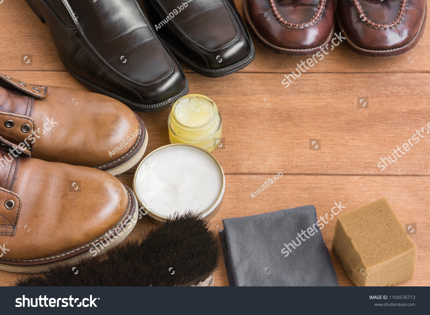 Old Leather Shoes On Wooden Stock Photo 