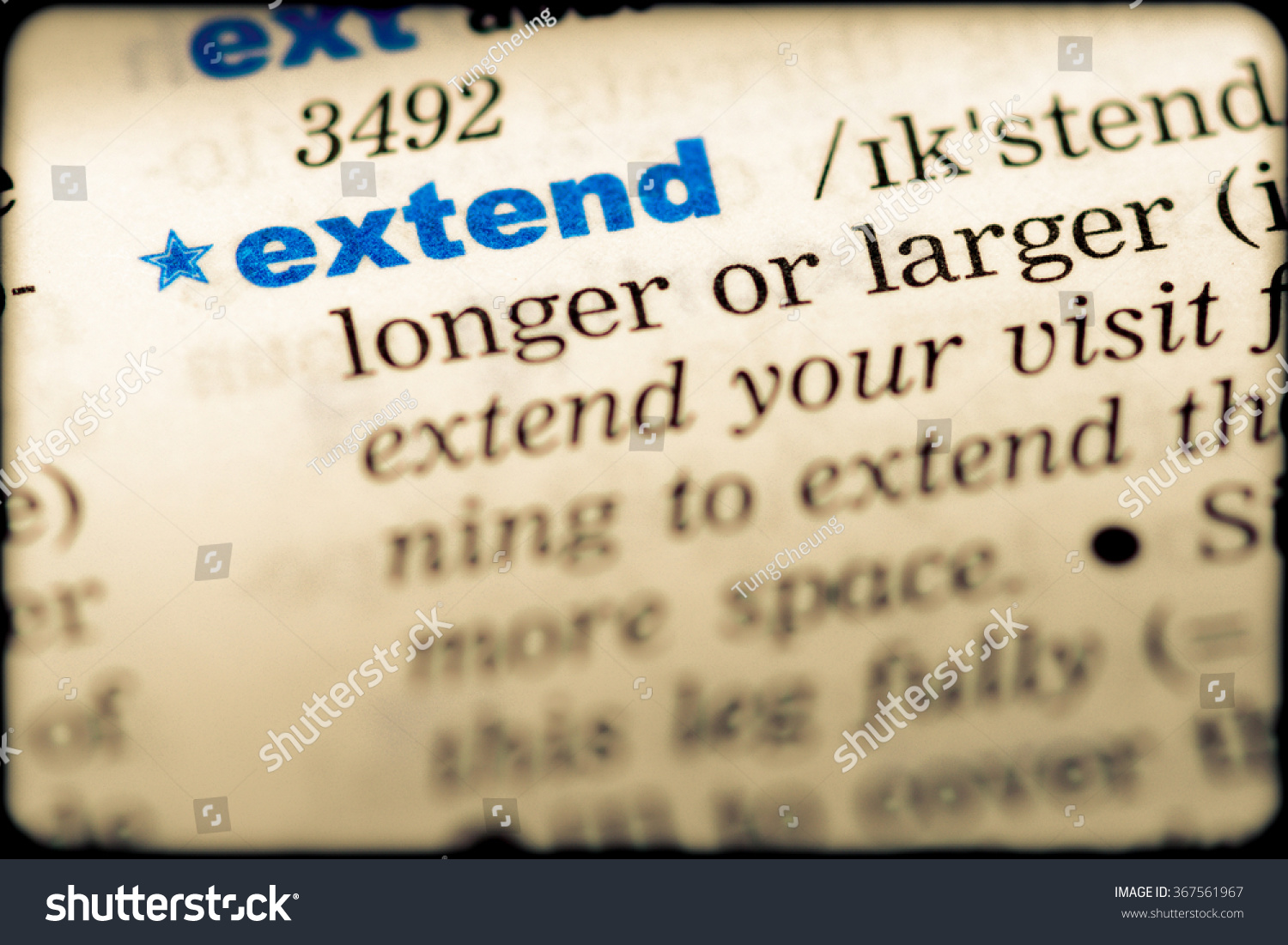 closeup-word-english-dictionary-extend-definition-stock-photo-367561967