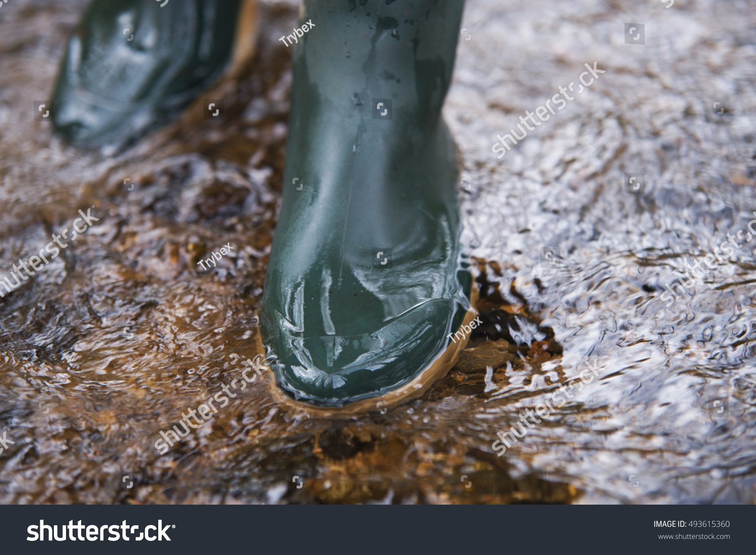 rubber boots in water
