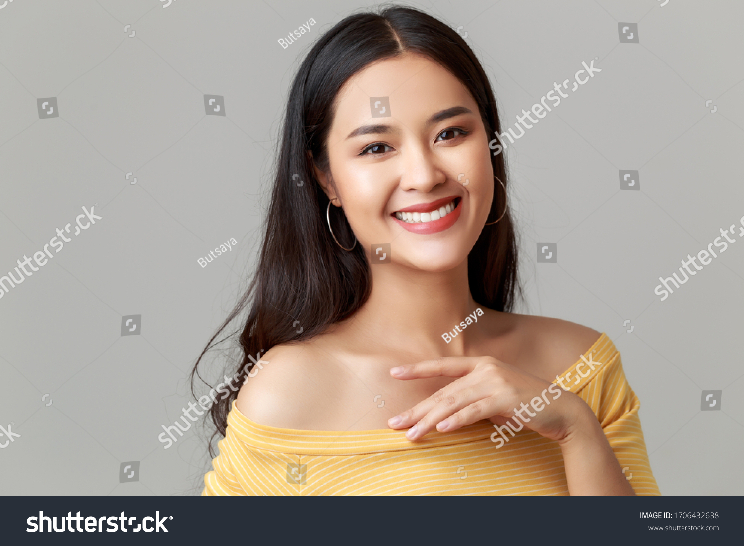 4 Close up young happy attractive girl wearing white showing shoulder