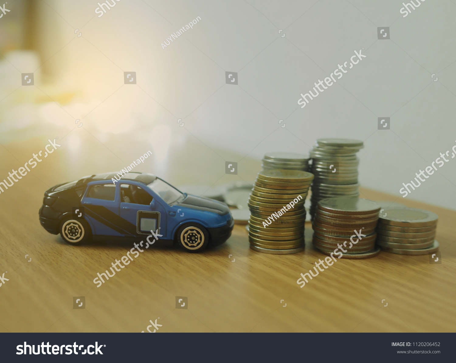 Closed Soft Focus Car Model Coins Stock Photo Edit Now 1120206452 - closed up and soft focus car model with coins finance and loan concept saving money image