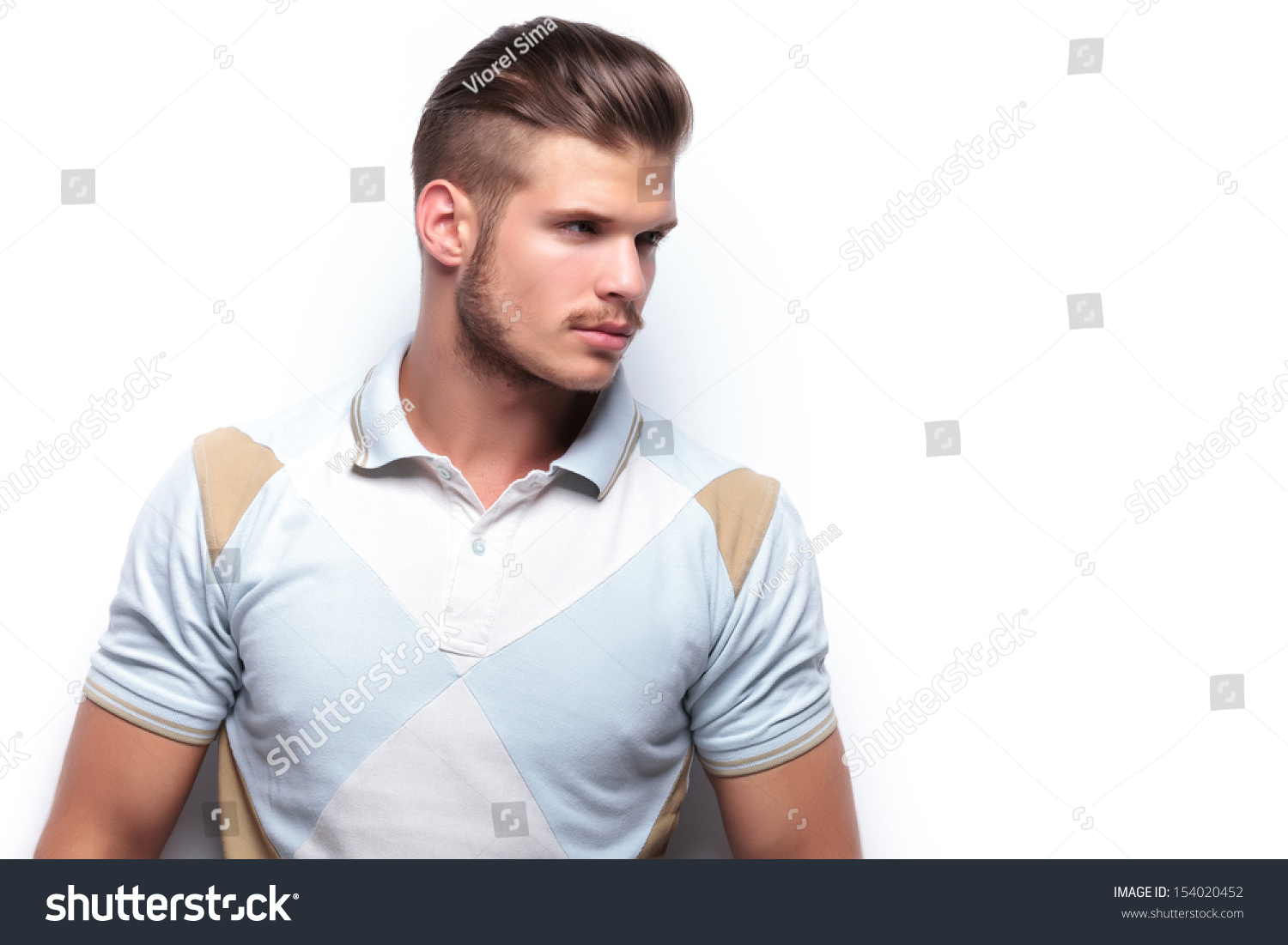 Closeup Young Casual Man Looking Away Stock Photo (Edit Now) 154020452