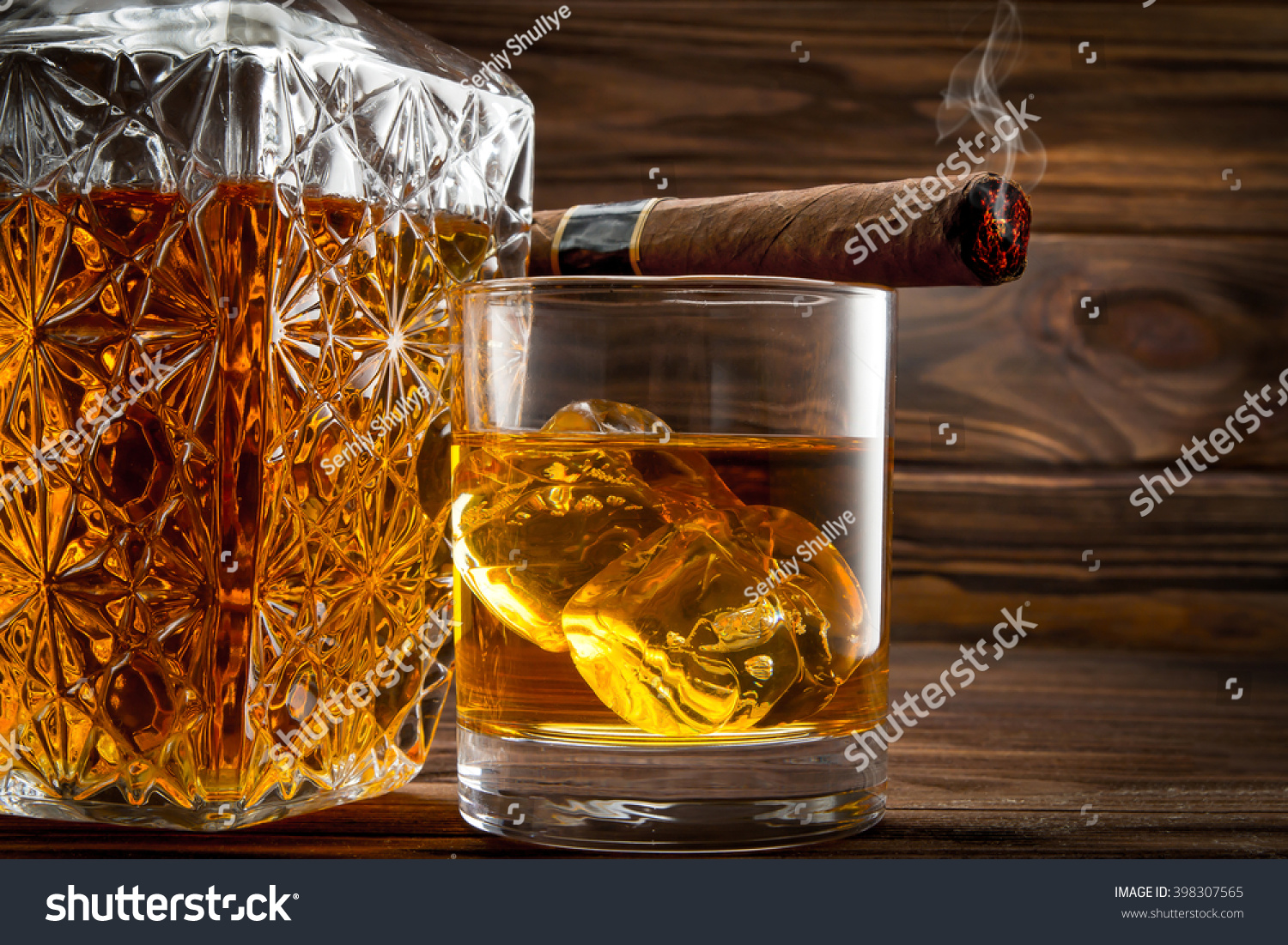 Download Closeup Bottle Glass Whiskey Smoldering Cigar Stock Photo Edit Now 398307565 Yellowimages Mockups
