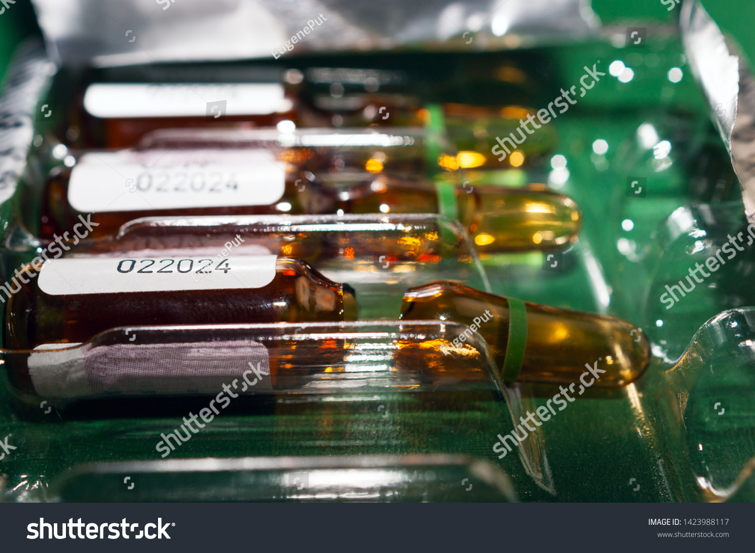 Download Closeup Brown Empty Opened Glass Ampoule Stock Photo Edit Now 1423988117 PSD Mockup Templates