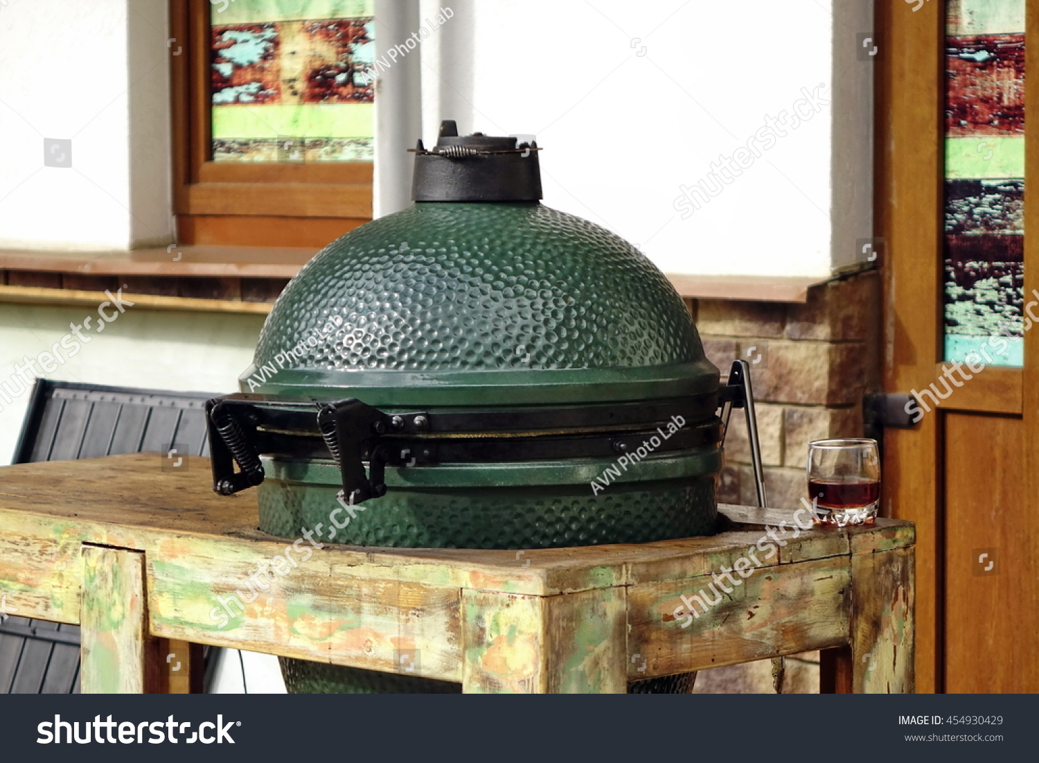 338 Big Green Egg Bbq Images Stock Photos Vectors Shutterstock   Stock Photo Closeup Of Green Ceramic Bbq Grill Mounted In The Table Referred To As A Kamado Or Mushikamado 454930429 