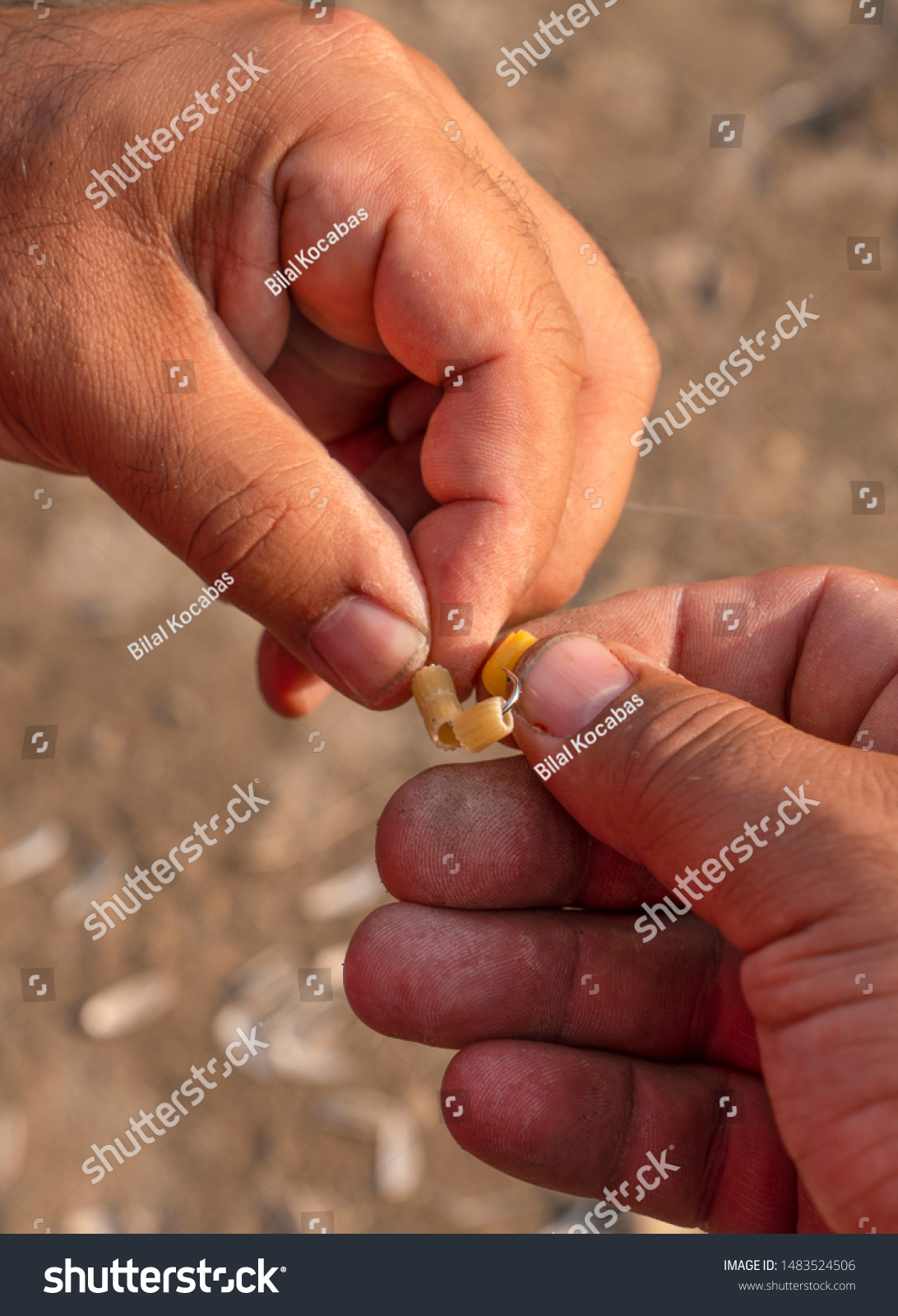 man with a hook for a hand