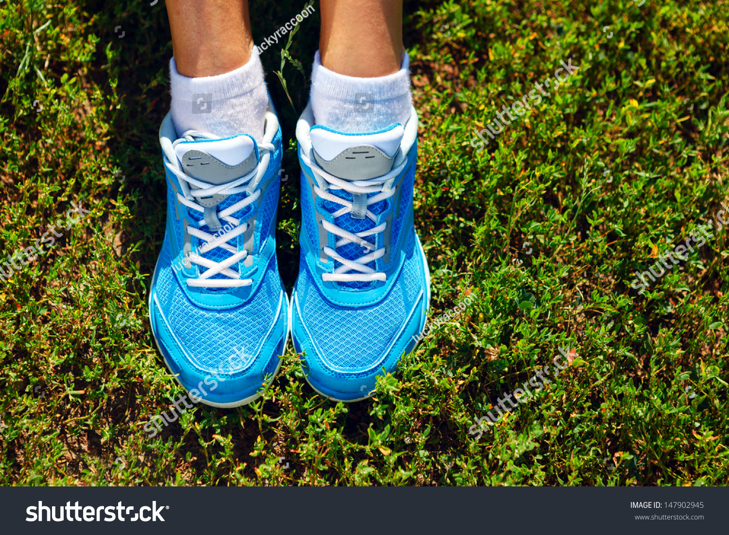 running spikes on grass